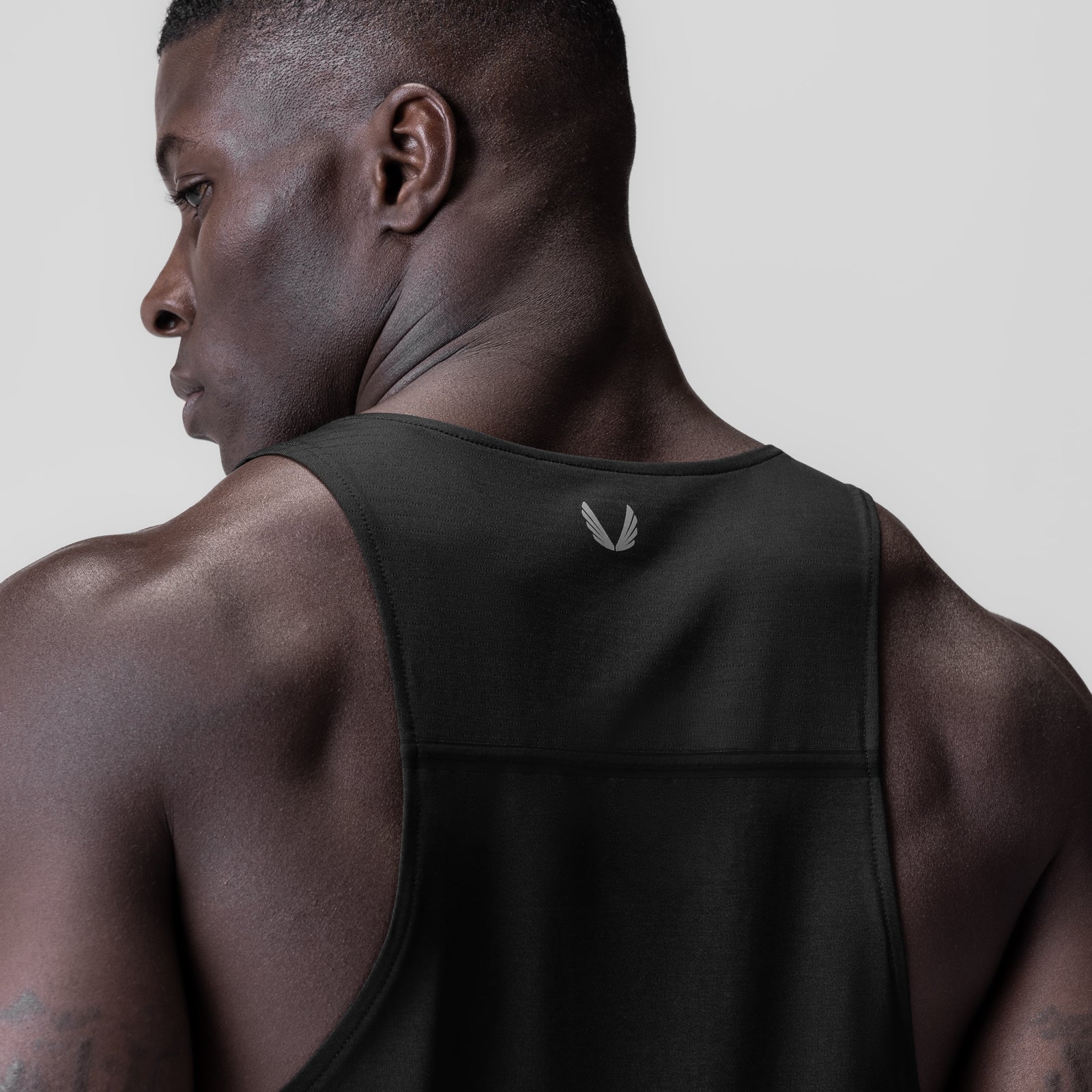 Black 3D-Lite® 2.0 Lycra® Pro Singlet worn by model, back view