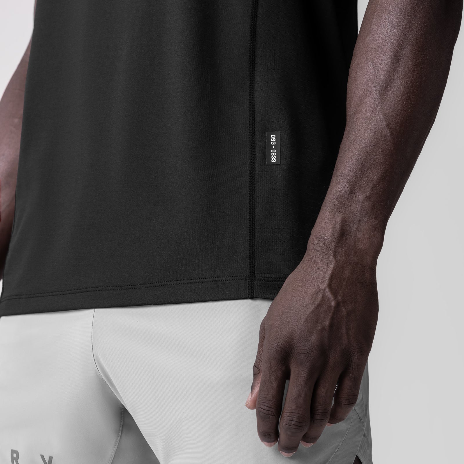 0833. 3D-Lite® 2.0 Lycra® Pro Singlet in black, worn on model, side view