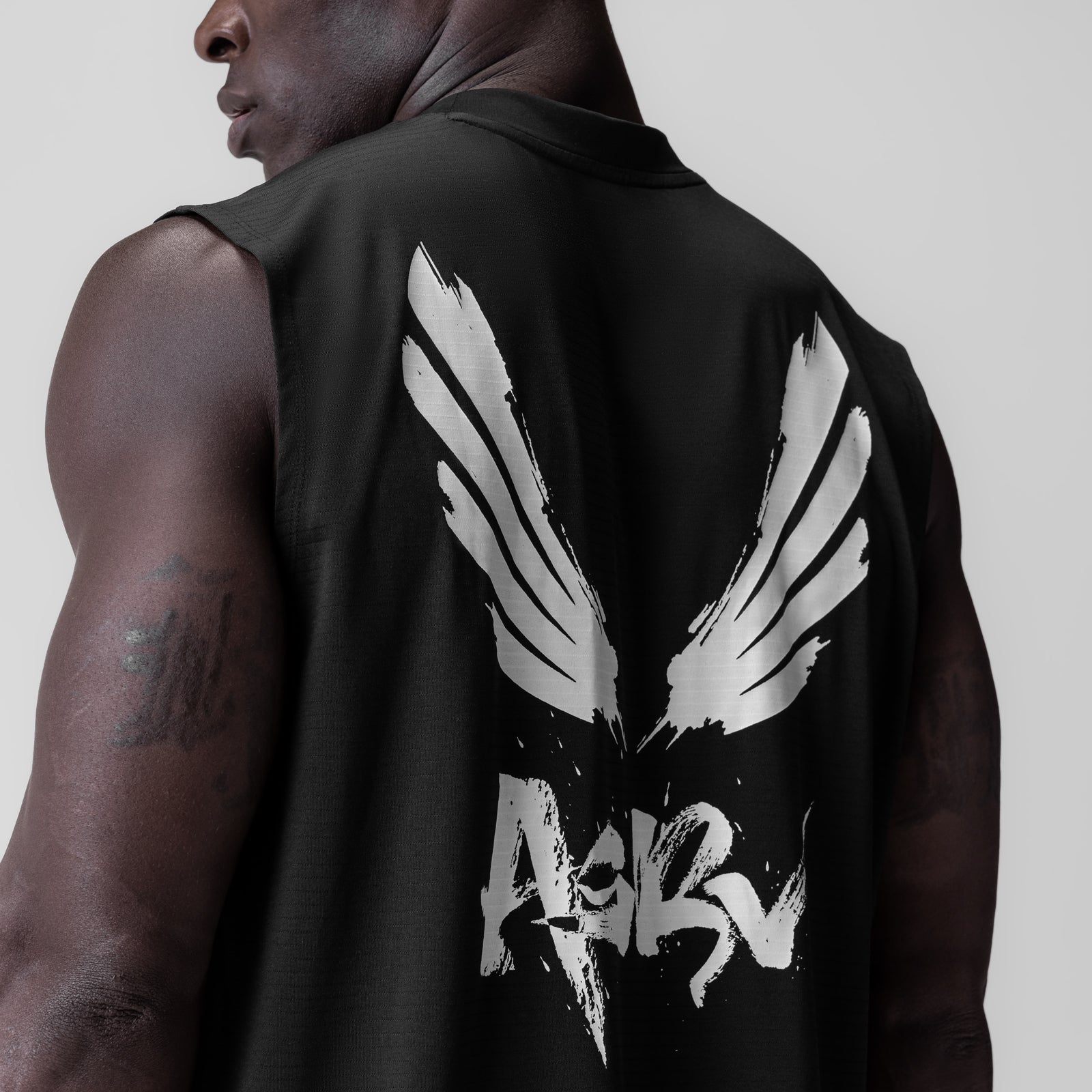 Black 3D-Lite® 2.0 Lycra® Relaxed Cutoff with white brush wings graphic, back view on model
