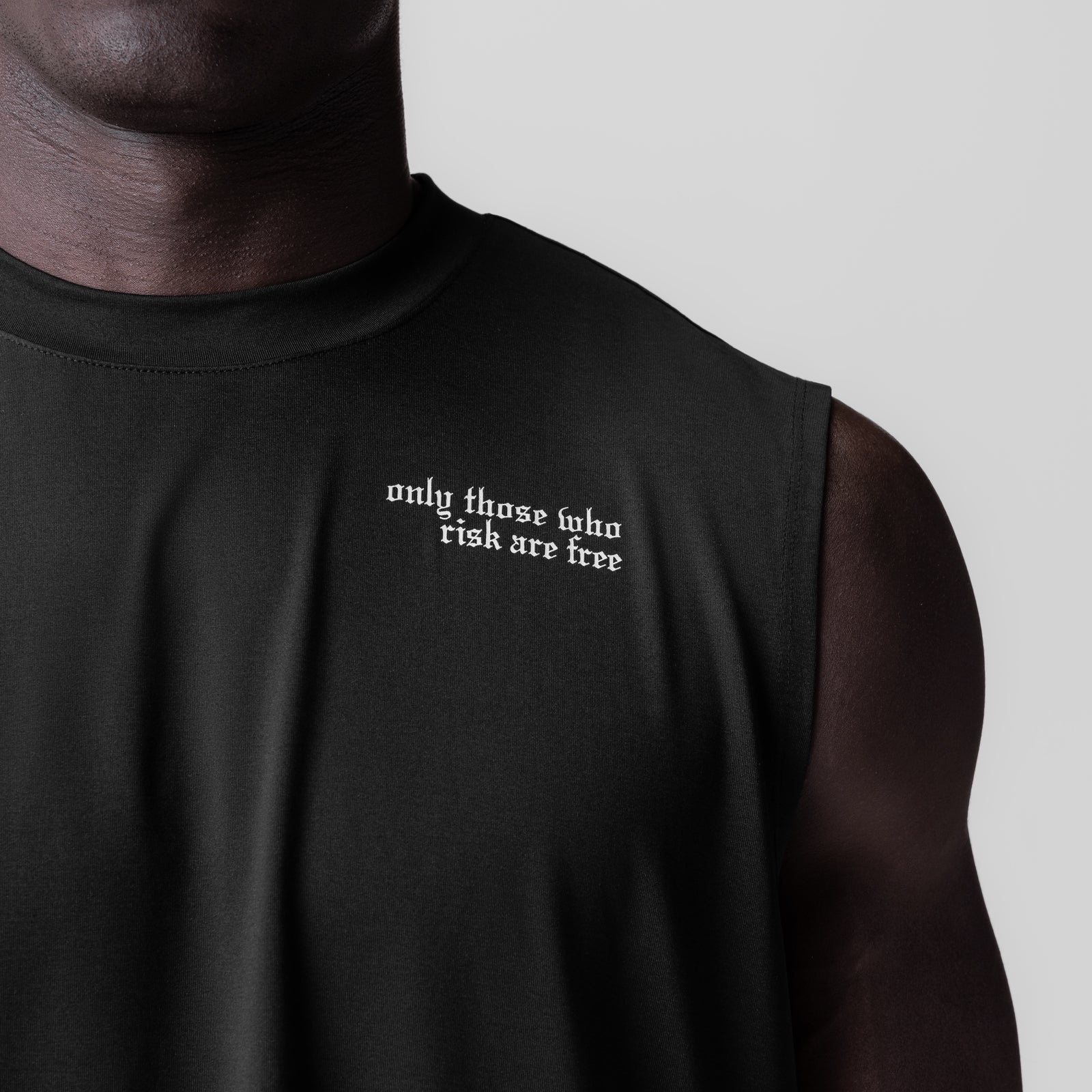 Black 3D-Lite® 2.0 Lycra® Relaxed Cutoff with 'only those who risk are free' text, worn by model