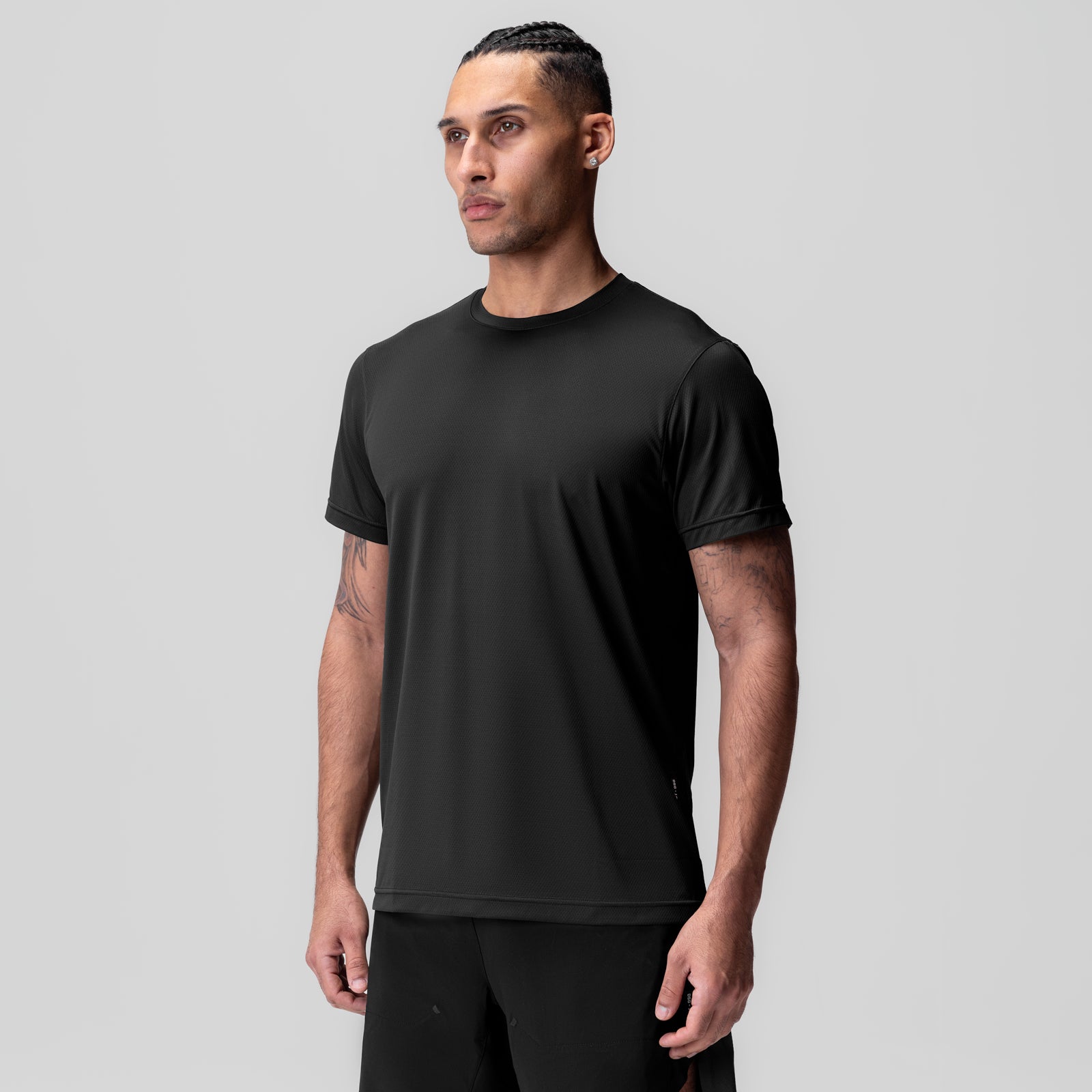 Black AeroSilver Essential Tee worn by model, front view