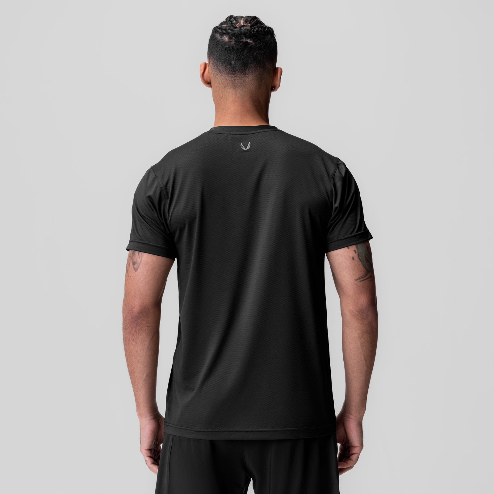 AeroSilver Essential Tee in black, rear view on model