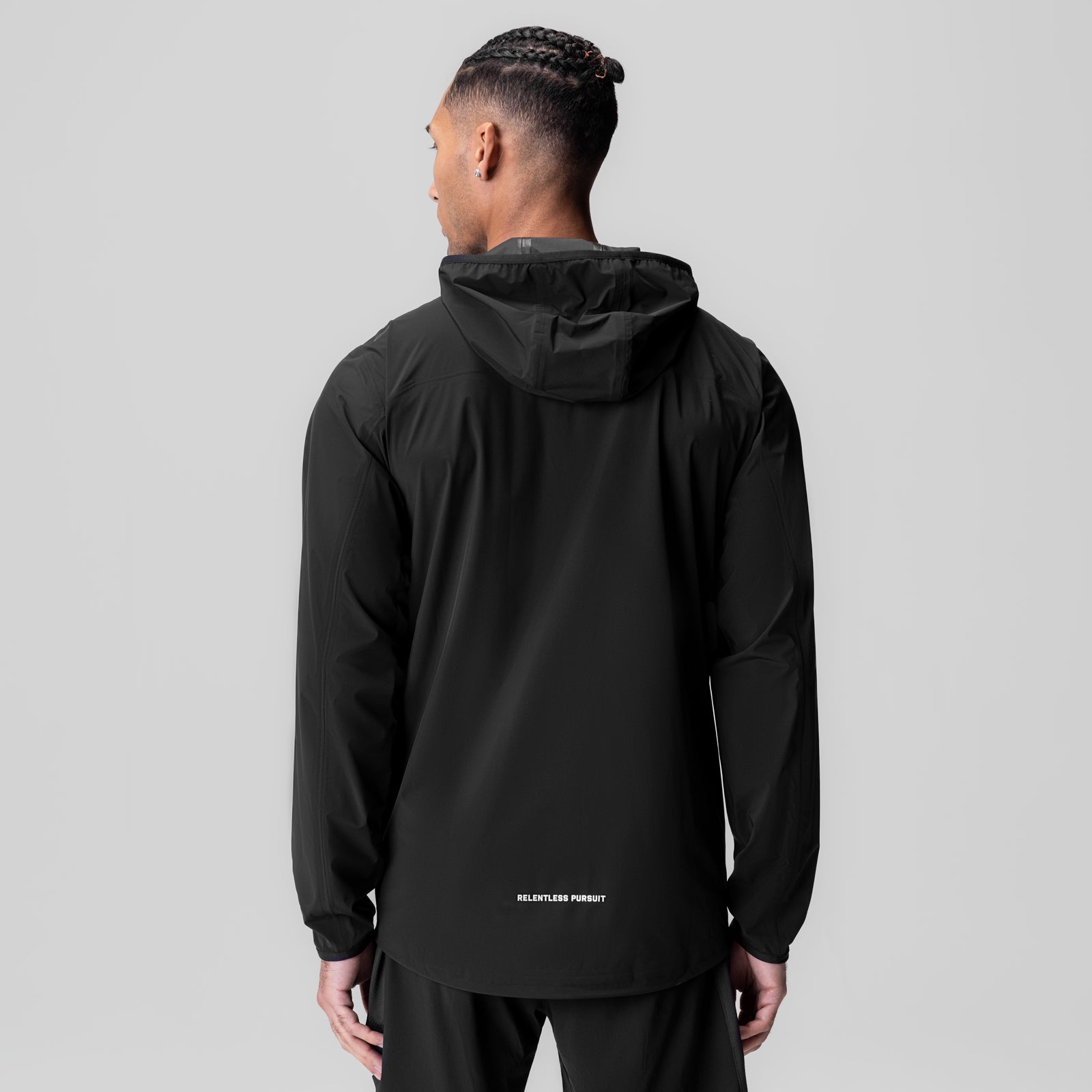 Black Aerotex Lightweight Windbreaker worn by model, back view