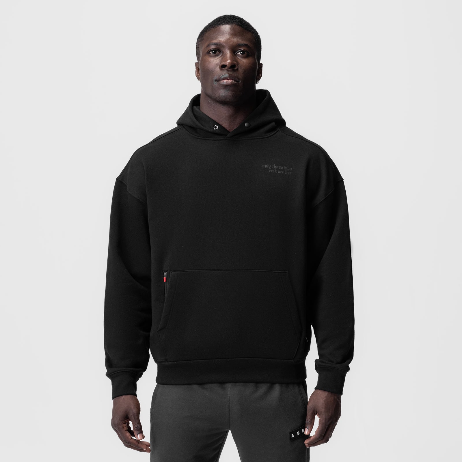 Tech-Terry Zip Pocket Hoodie in black worn by model, front view