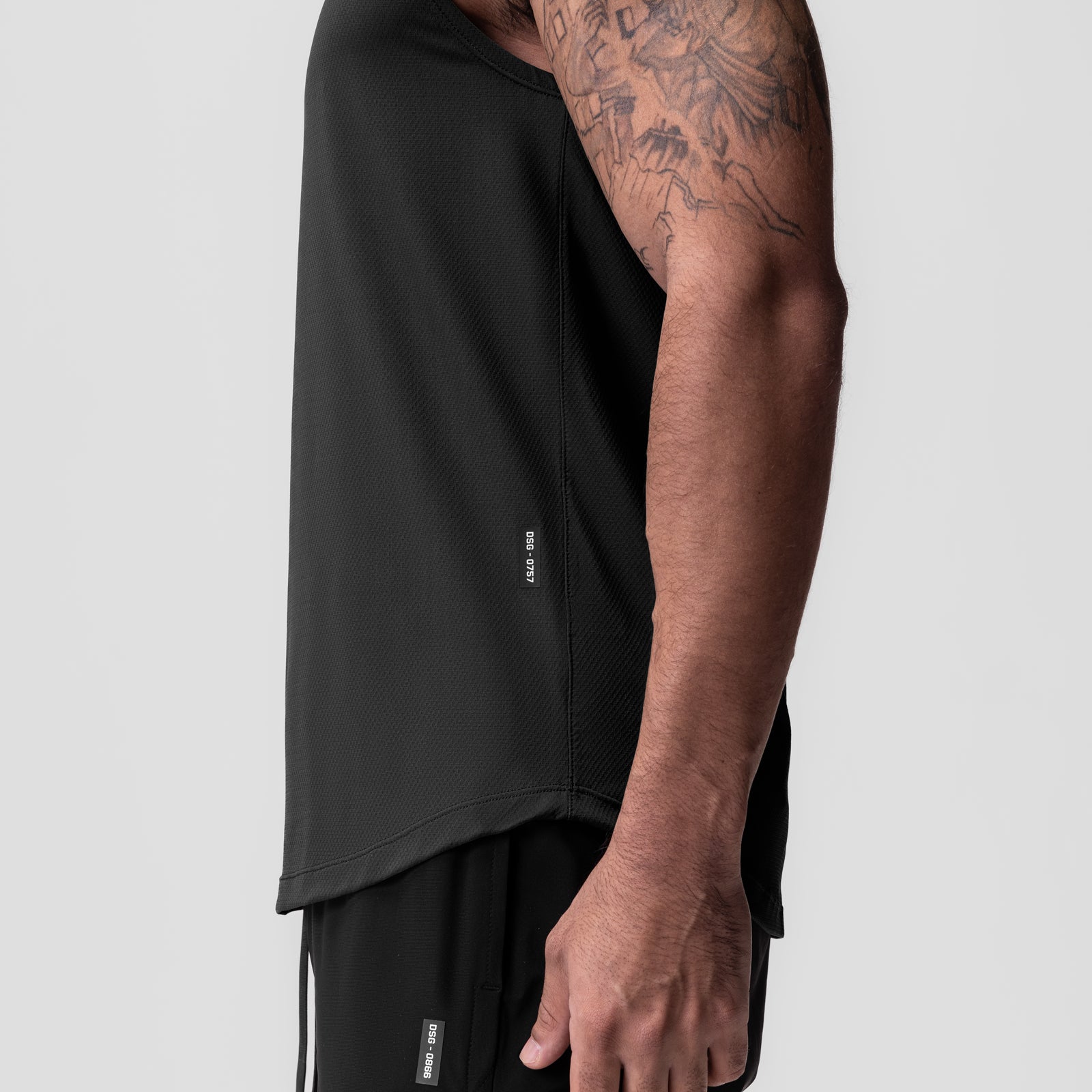 AeroSilver® Cutoff Tank in black worn by model showing side view