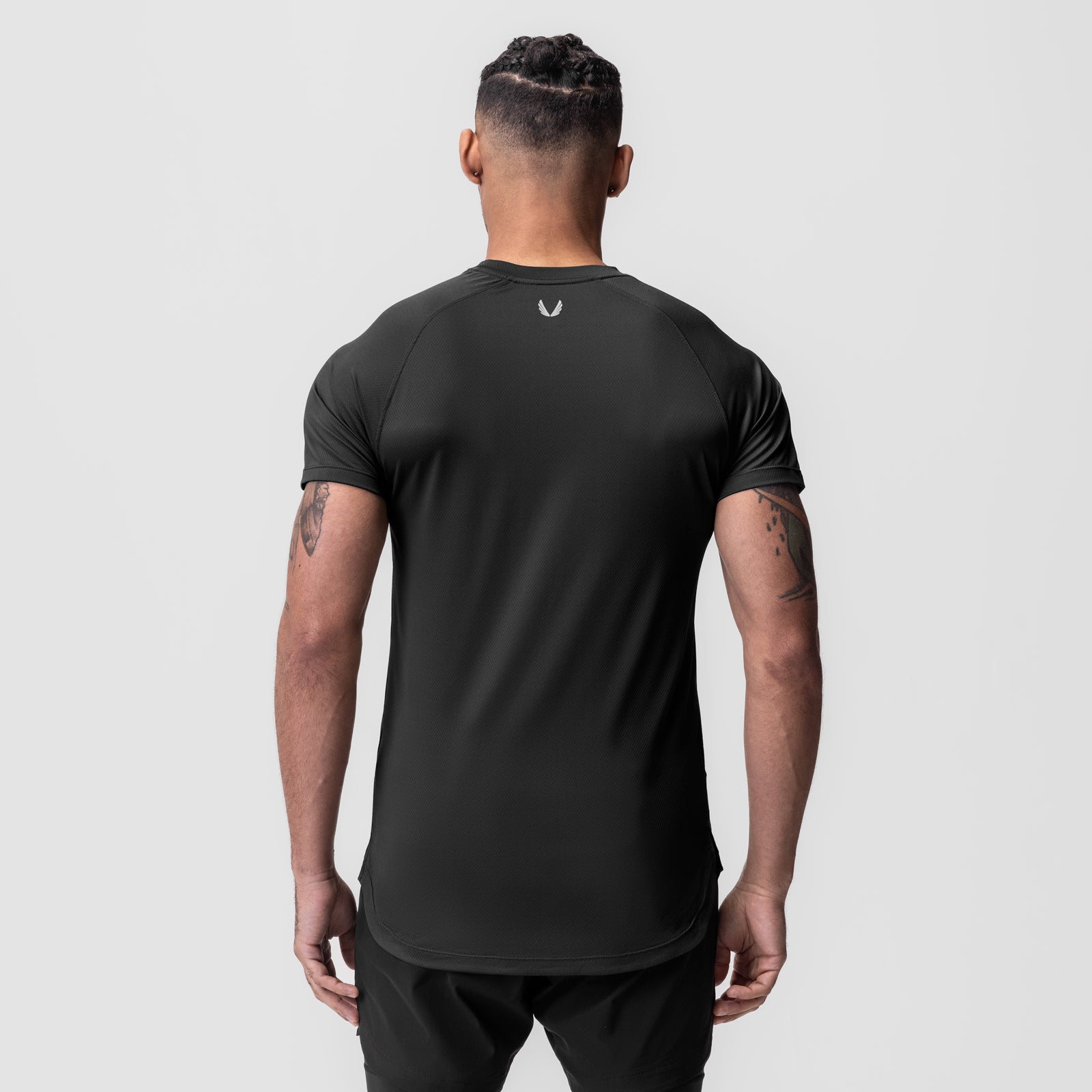 AeroSilver Established Tee in black, rear view on model
