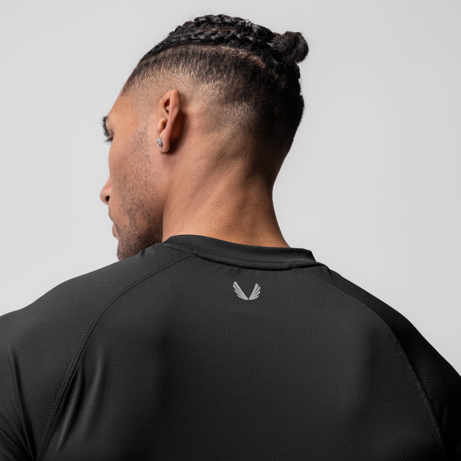 AeroSilver® Fitted Tee in black, rear view worn by model