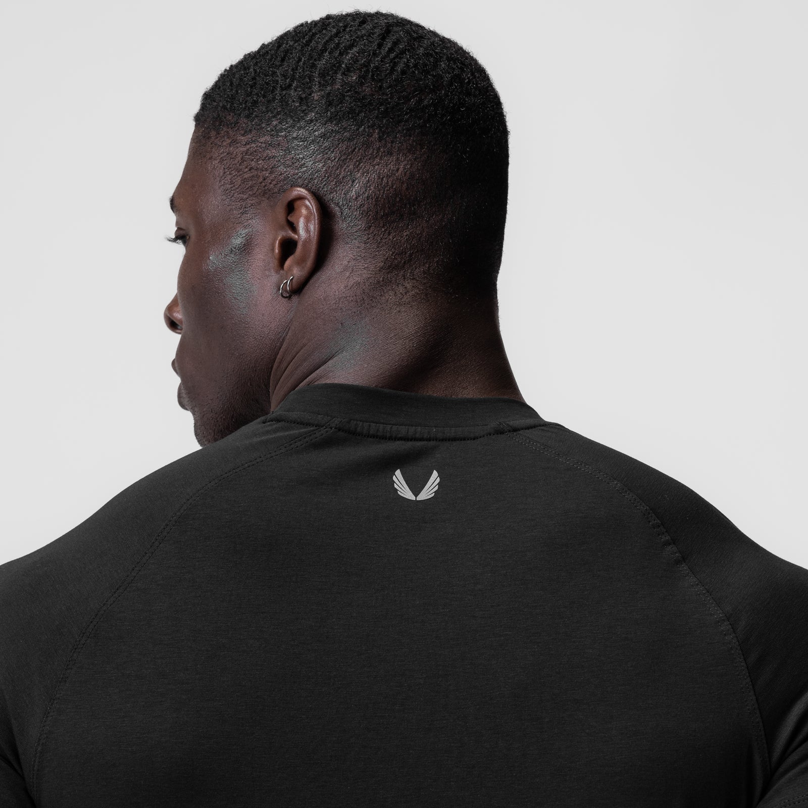 Supima Fitted Tee in black, back view on model