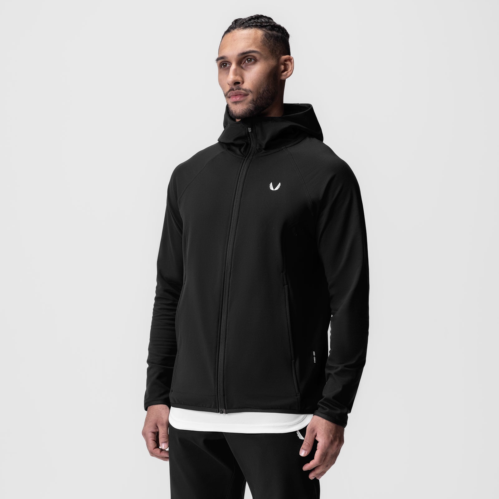 Performance Fleece Zip Hoodie in black worn by male model, front view