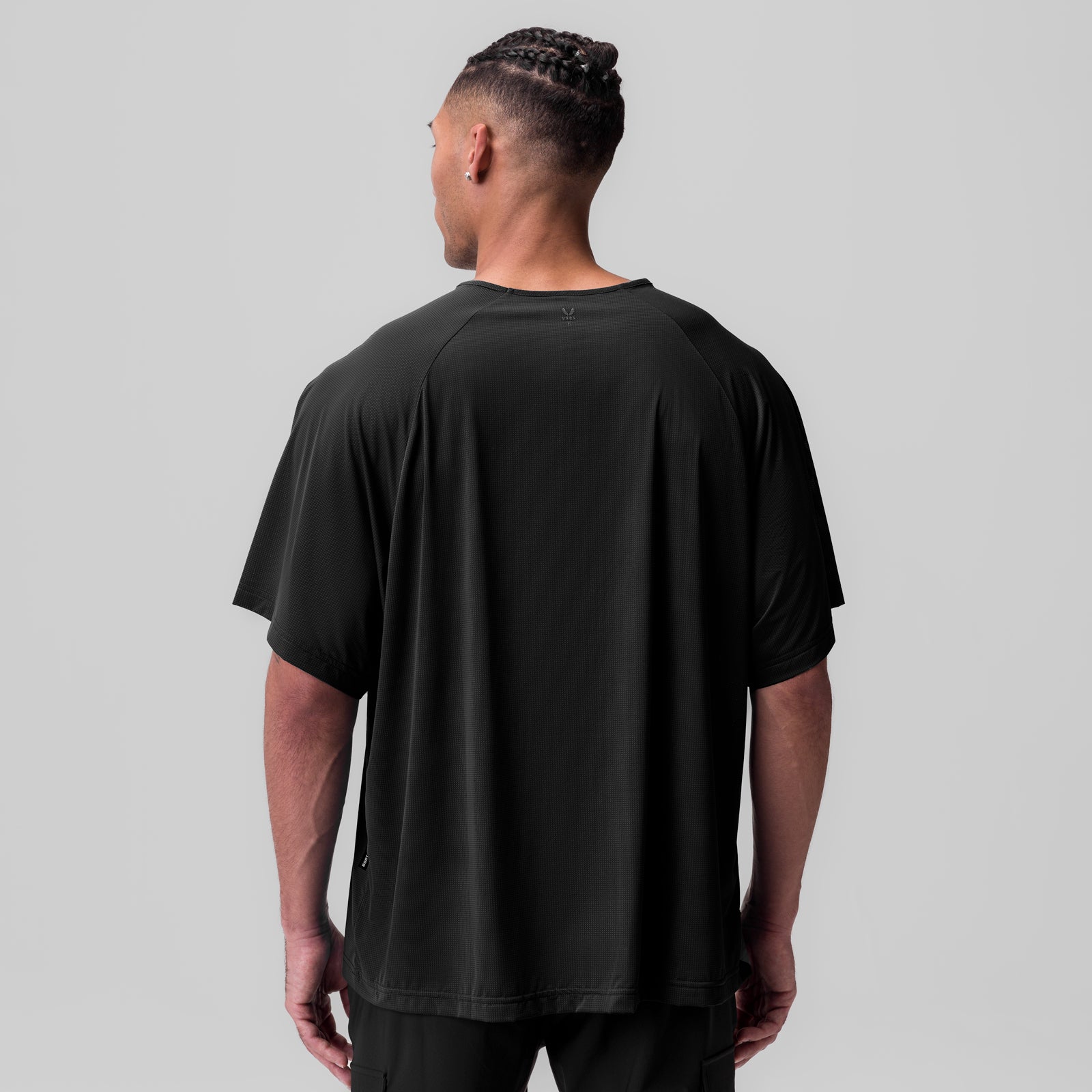 Ice-Skin Oversized Tee in black, back view on model
