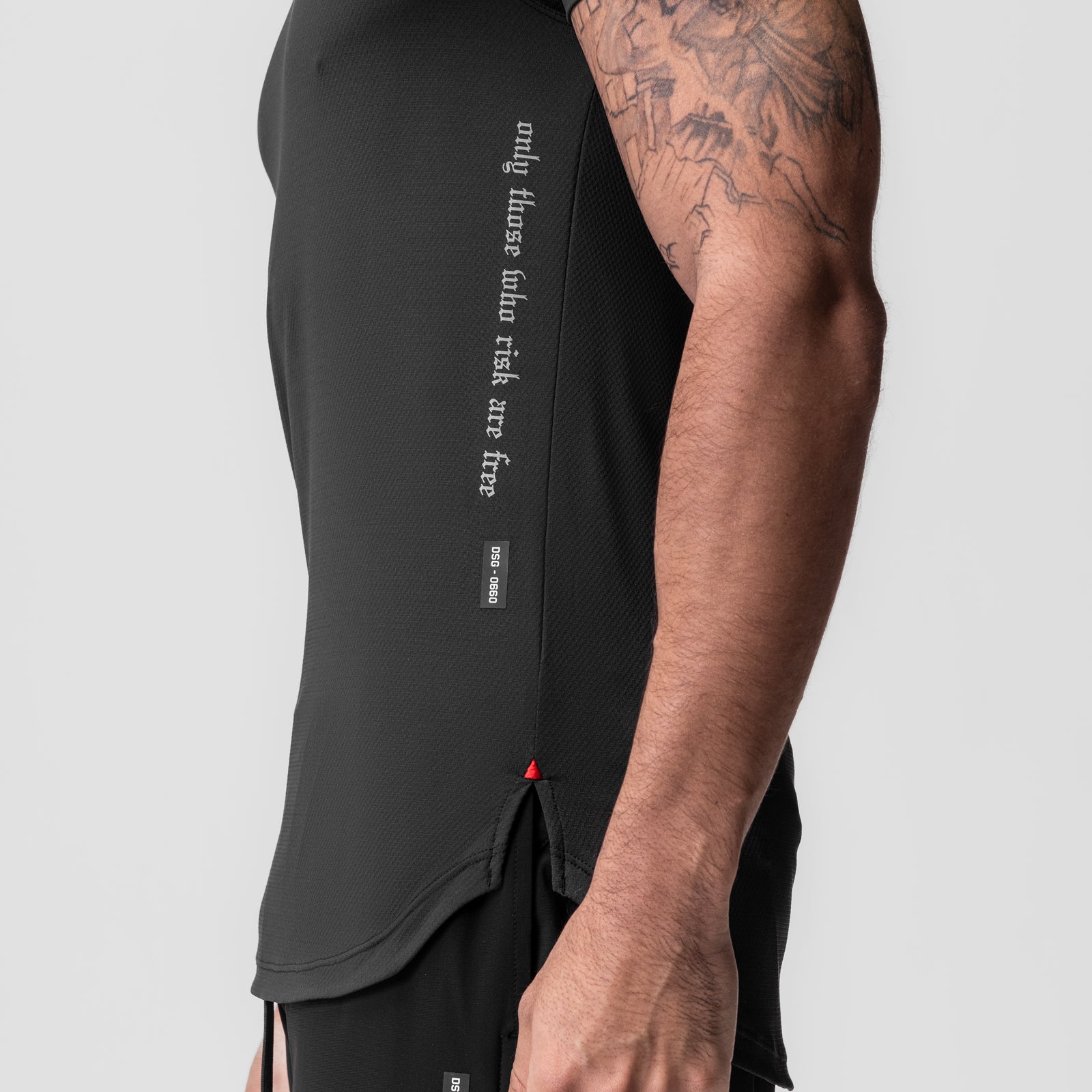 Black AeroSilver Established Tee worn by model, side view showing graphic text and design