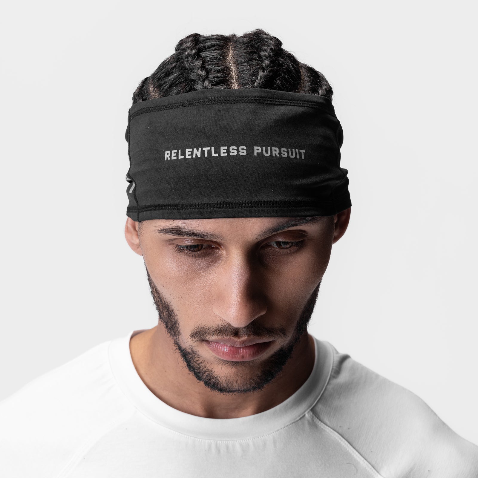 ASRV Relentless Pursuit headband in black, worn by model, front view