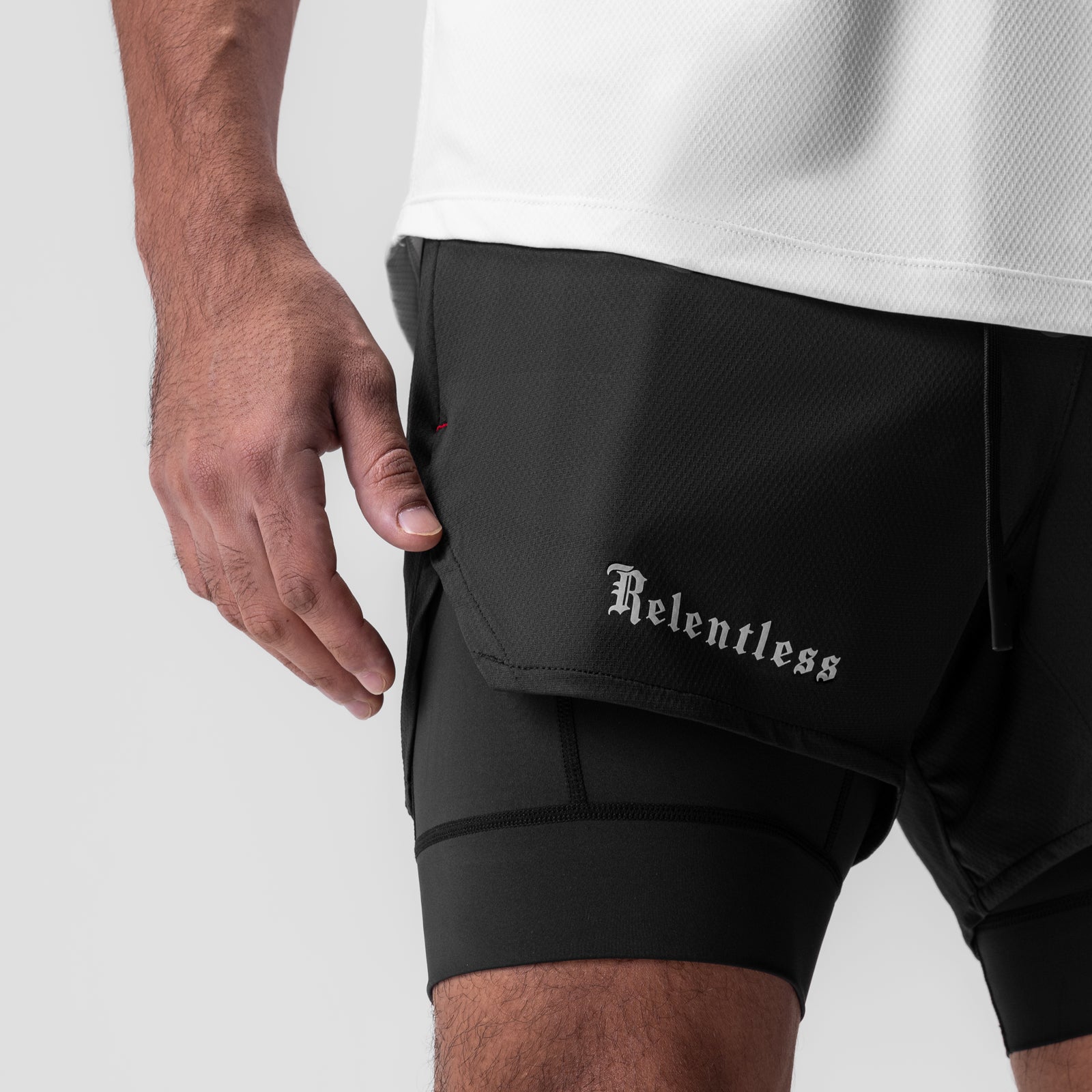 AeroSilver 5" Liner Short in black worn by model, side view showing pocket detail