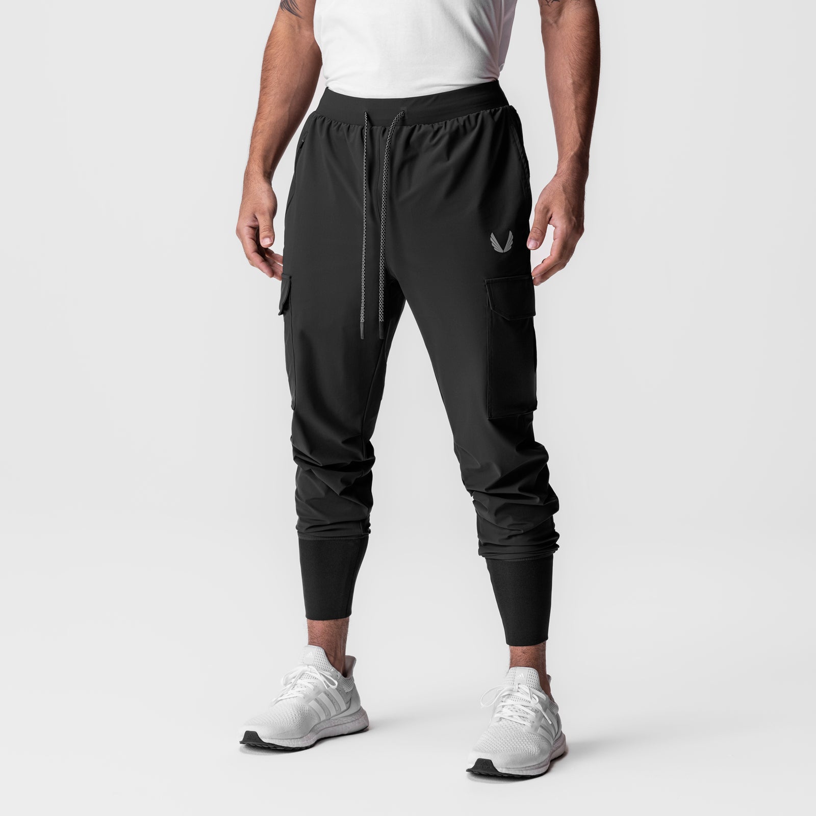 Black Tetra-Lite Cargo High Rib Jogger with reflective details, modeled from front