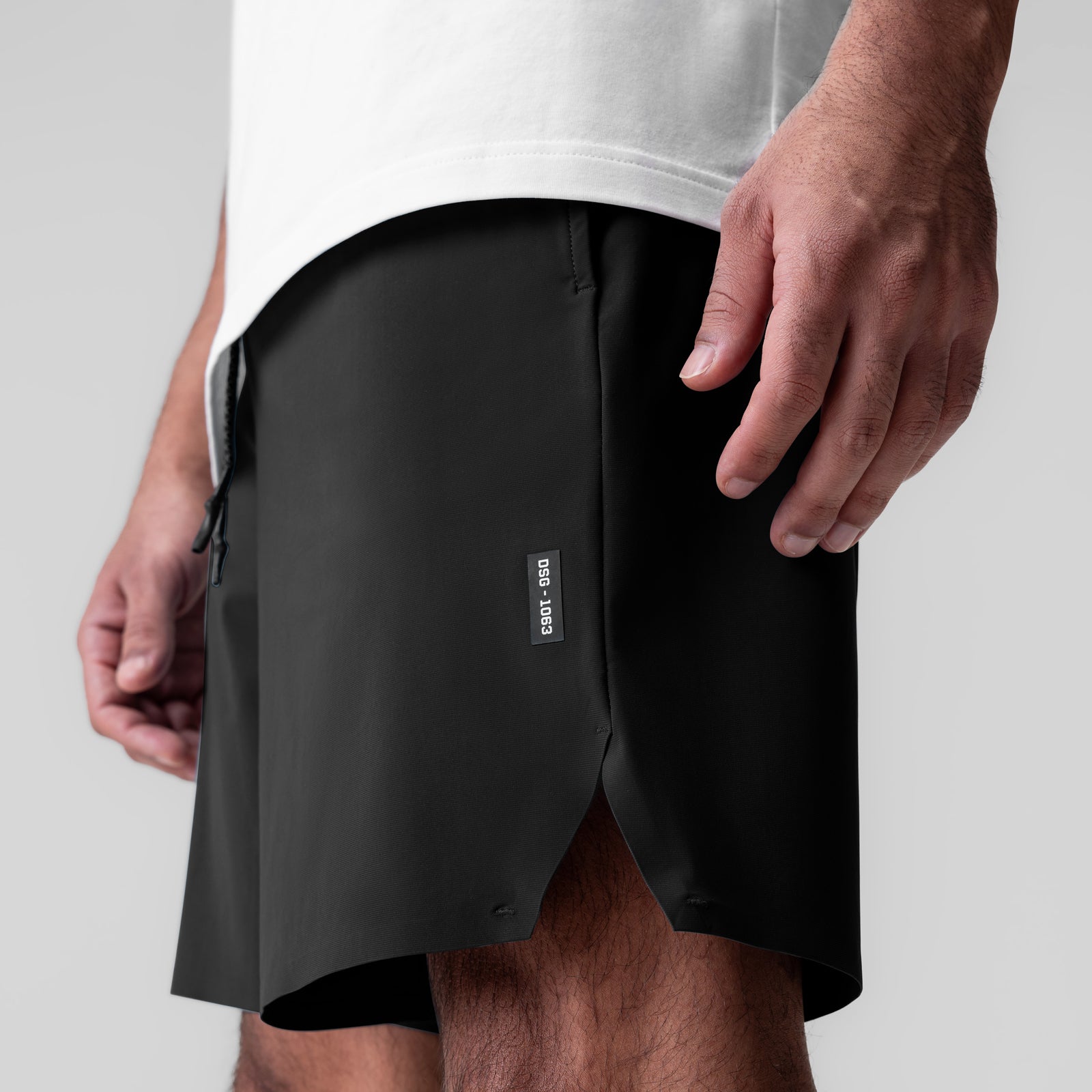Revolutional Field Short in black, worn by model showing side view and fit