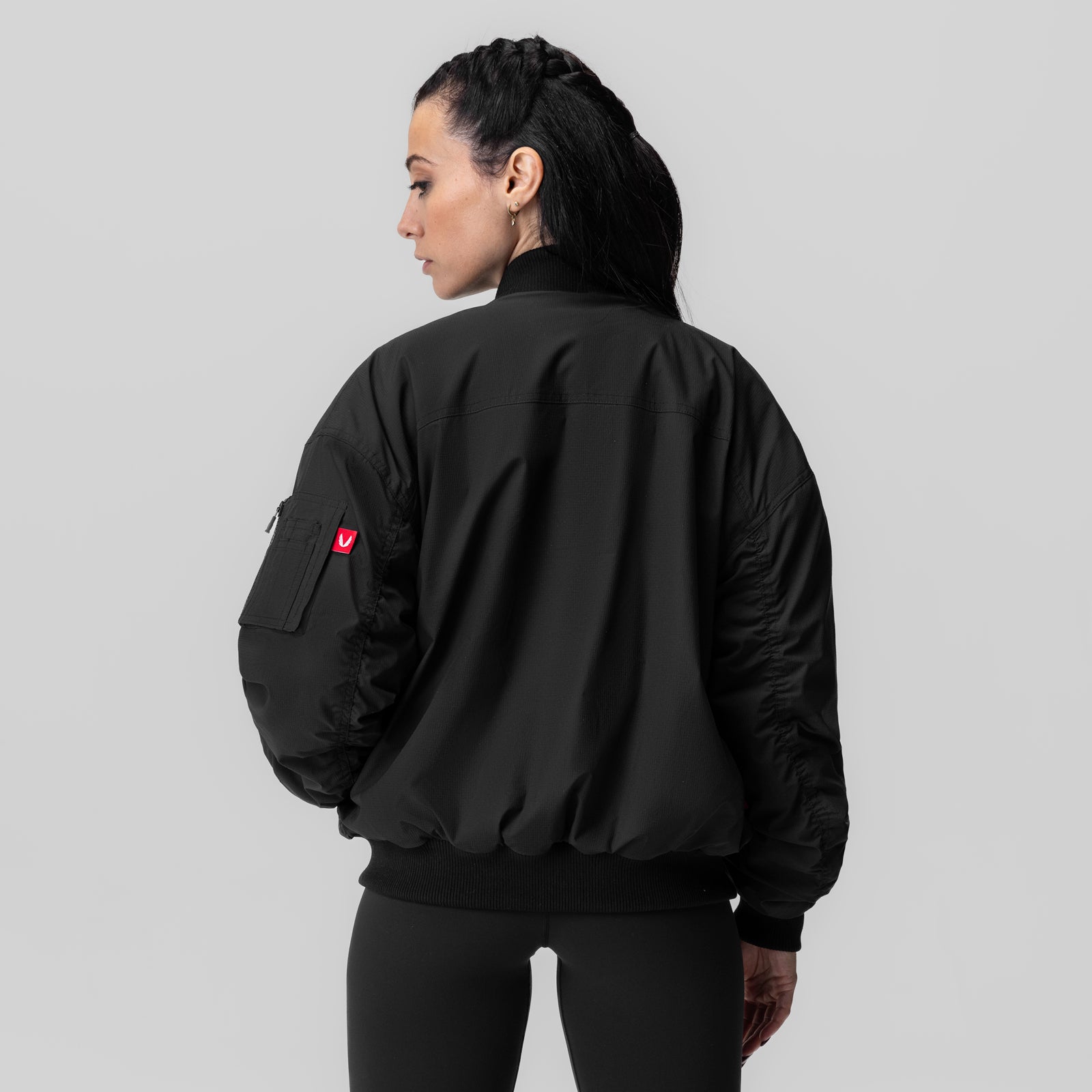 Women's Sherpa-Lined Insulated Bomber Jacket in black, back view on model