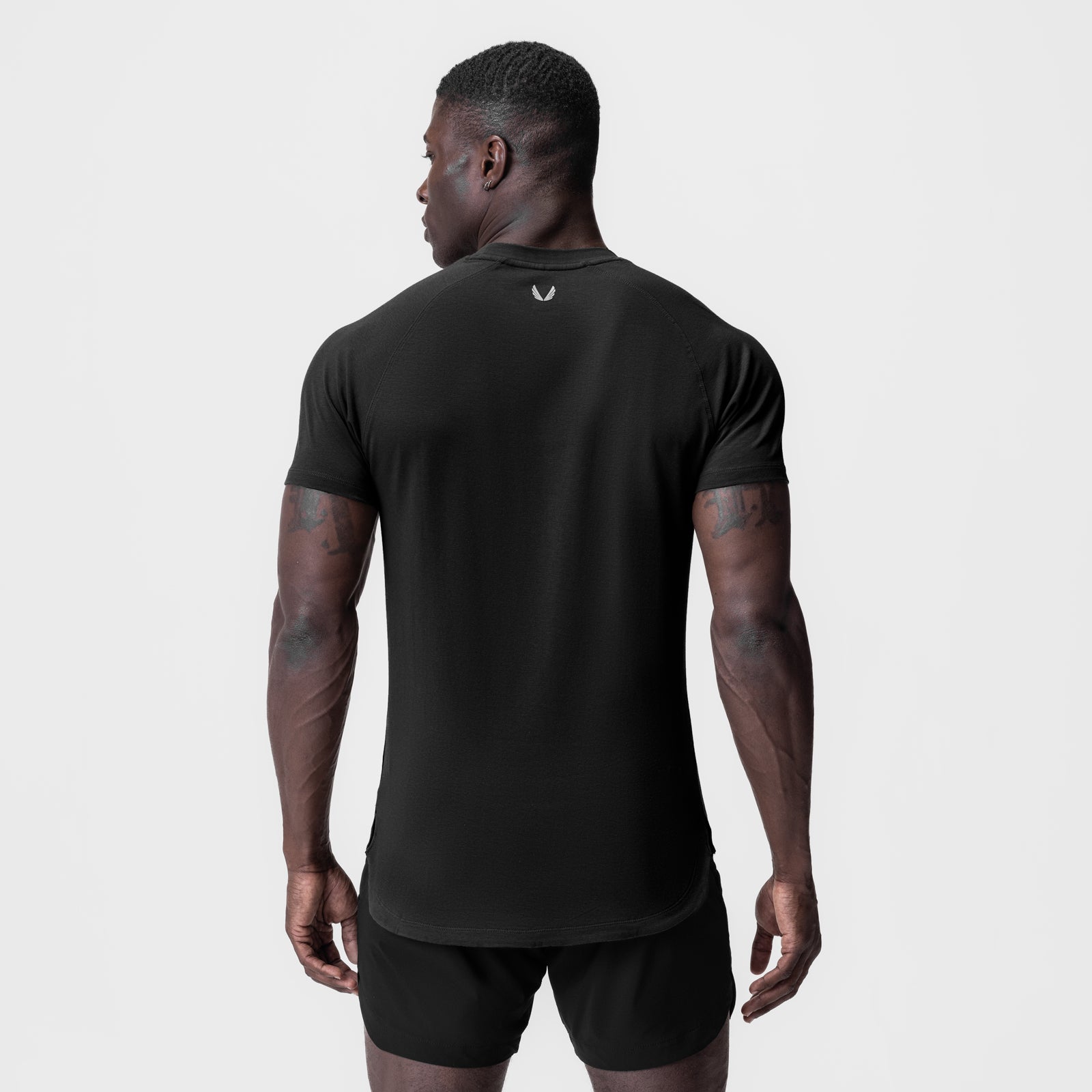 Black Supima Established Tee worn by model, back view