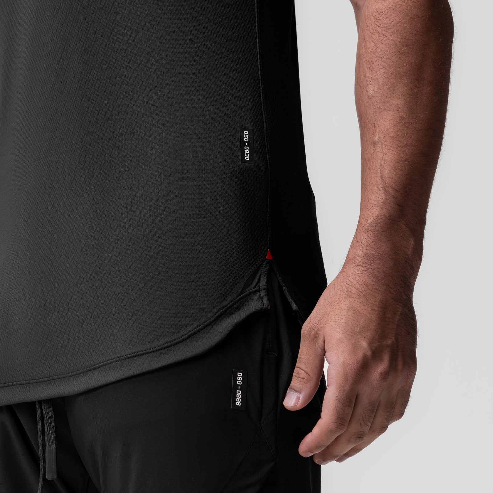 AeroSilver® tank top in black worn by model, side view showing fit