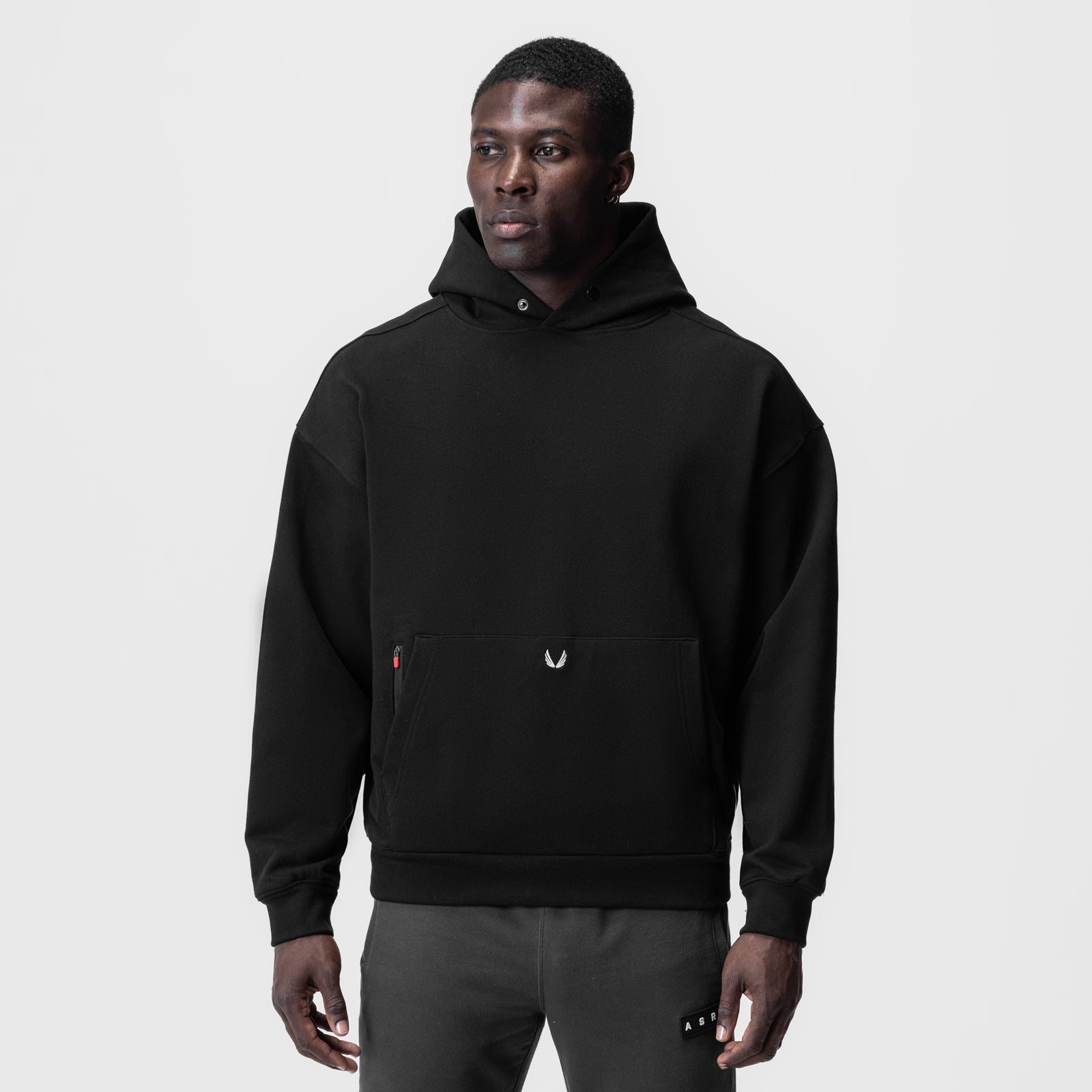 Tech-Terry Zip Pocket Hoodie in black, front view on model