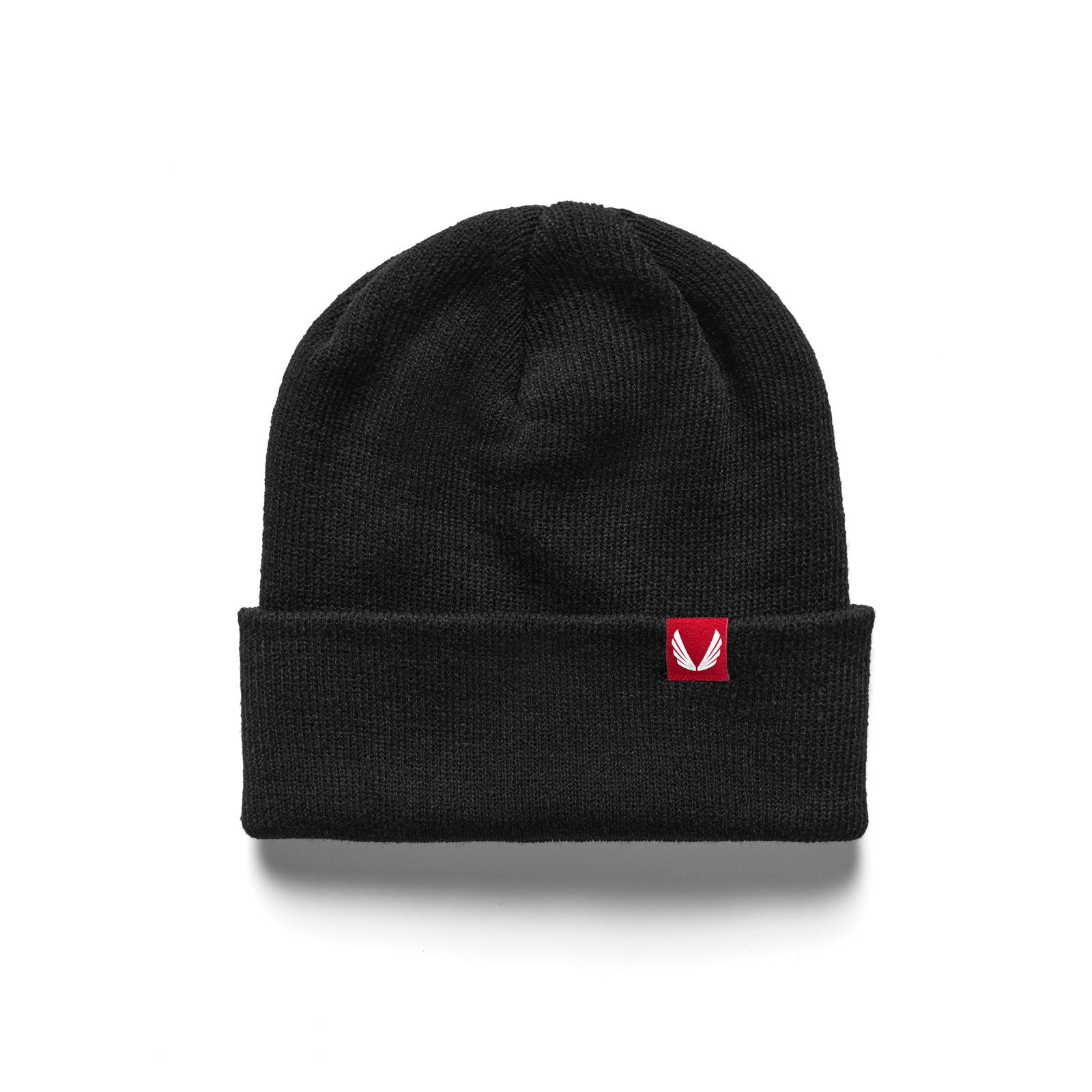 flatlay Essential Beanie in black with red logo patch, front view