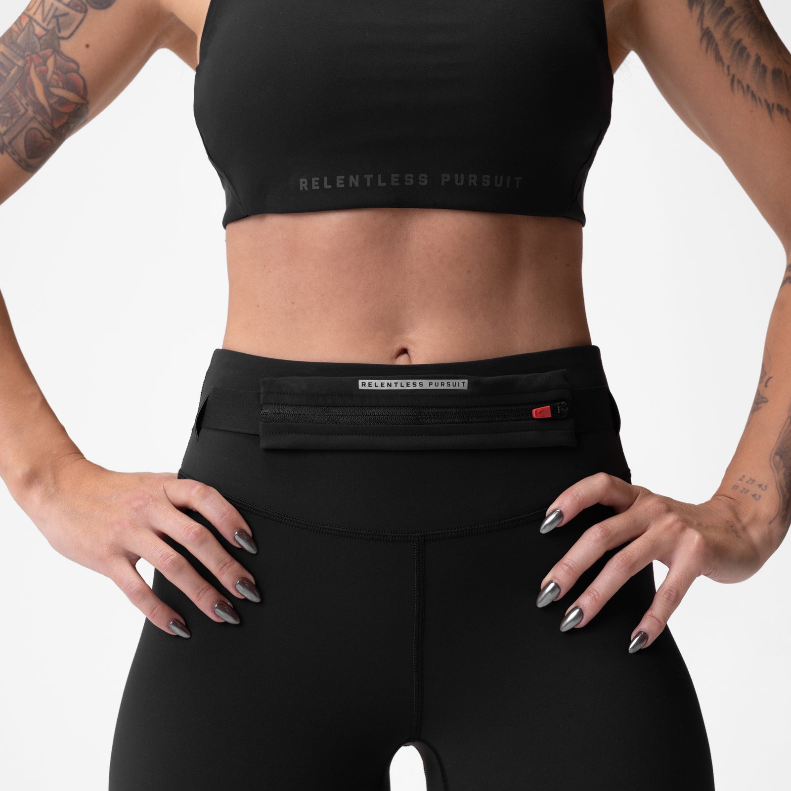 Black ASRV x Equinox Lycra® 3-in-1 legging worn by model, front view