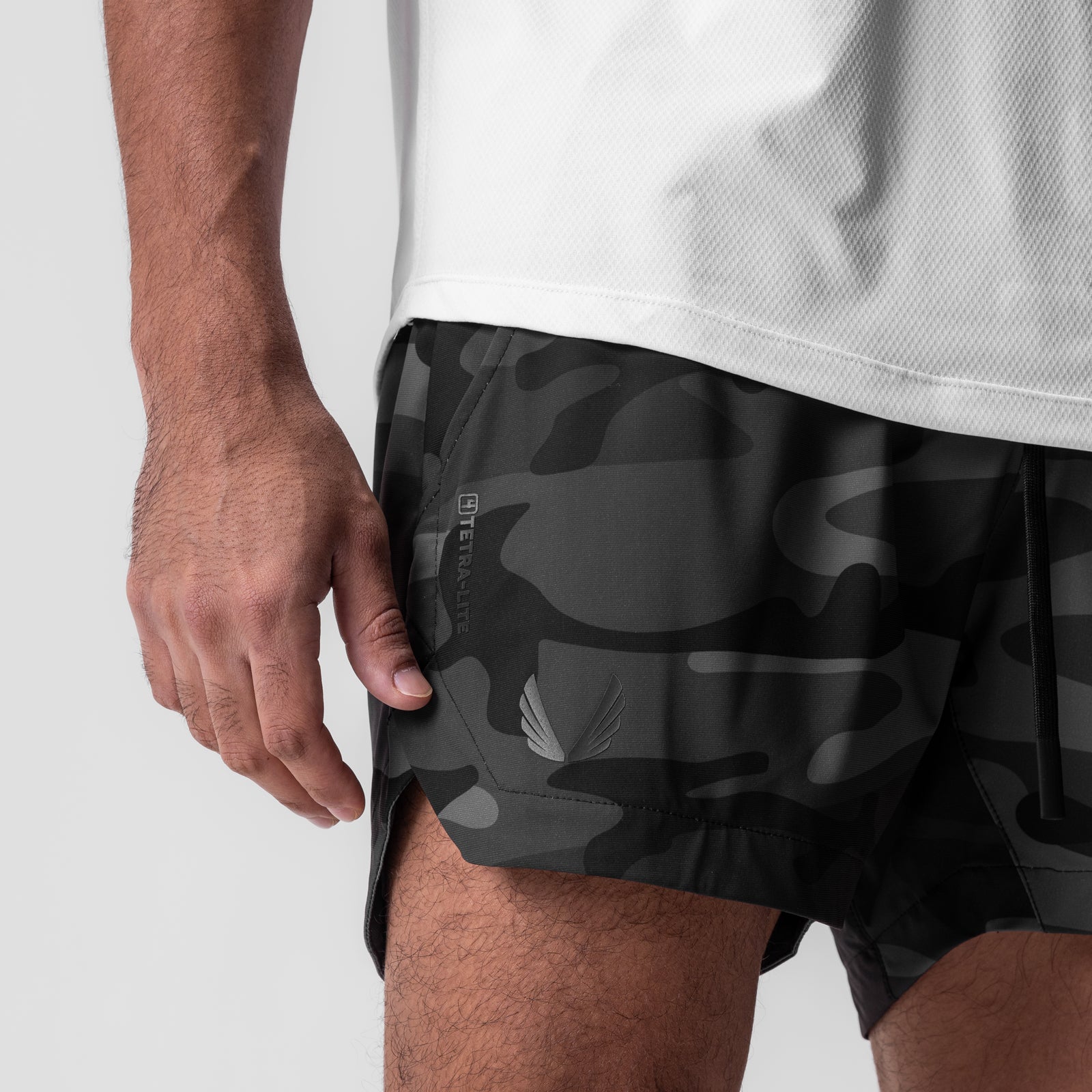 Tetra-Lite® 5" Linerless Short in Black Camo Wings, worn by model, side view