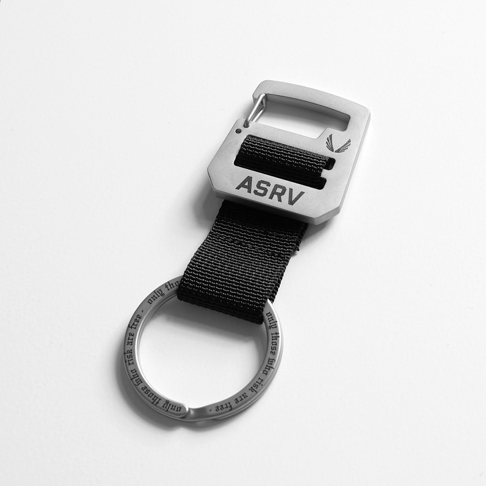 flatlay ASRV Clip Loop Keychain in stainless steel and black, overhead view