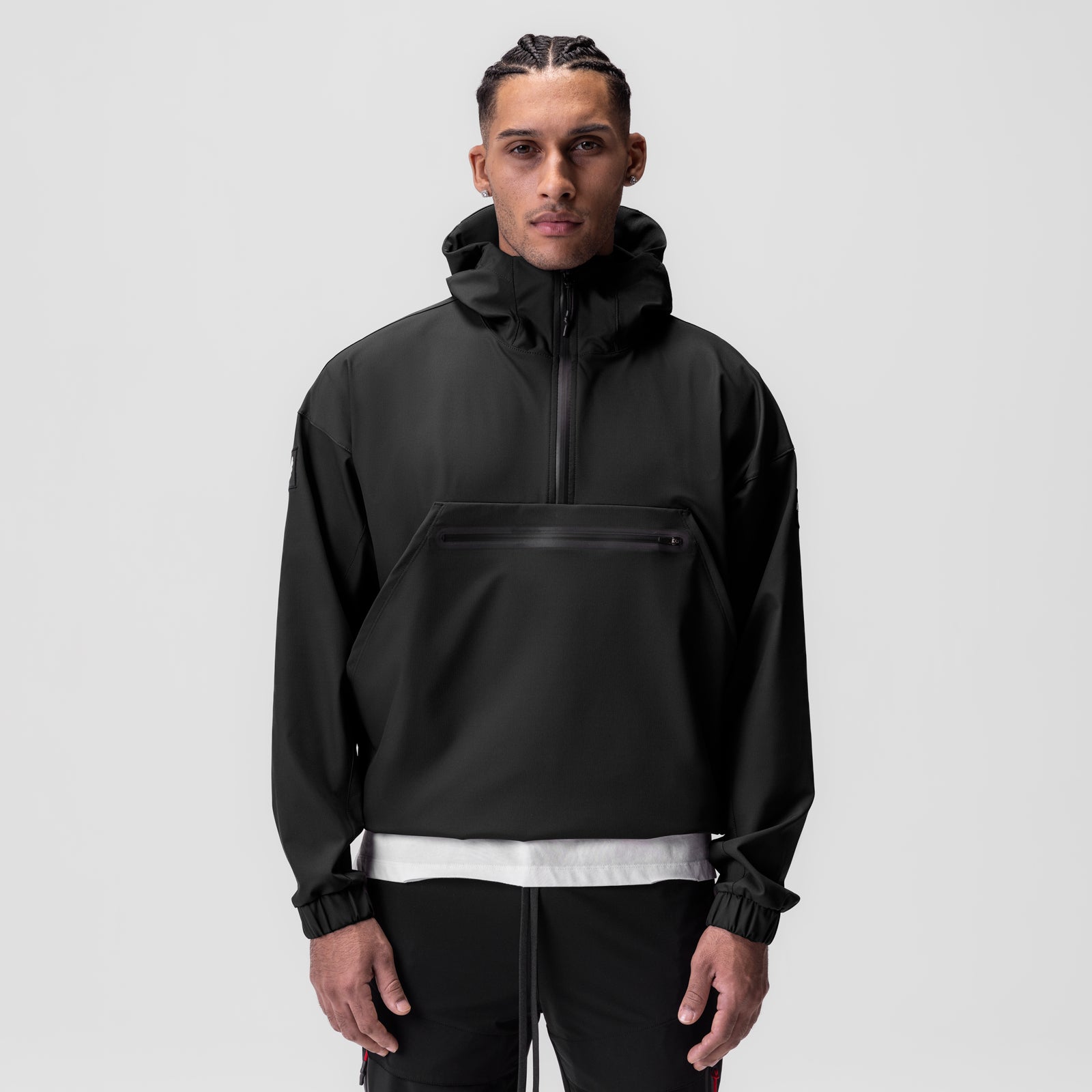 Black Weather-Ready Anorak Jacket worn by model, front view with white stripe detail