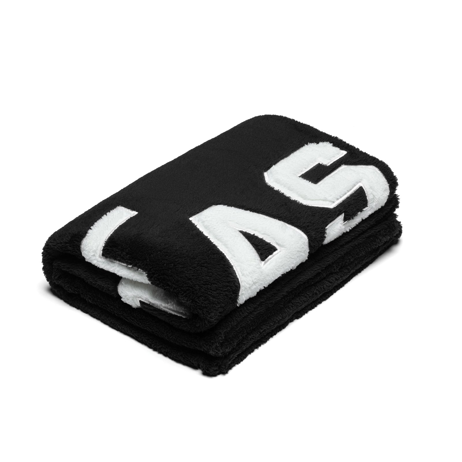 flatlay 0888. Sherpa Recovery Blanket in black with white logo, folded overhead view