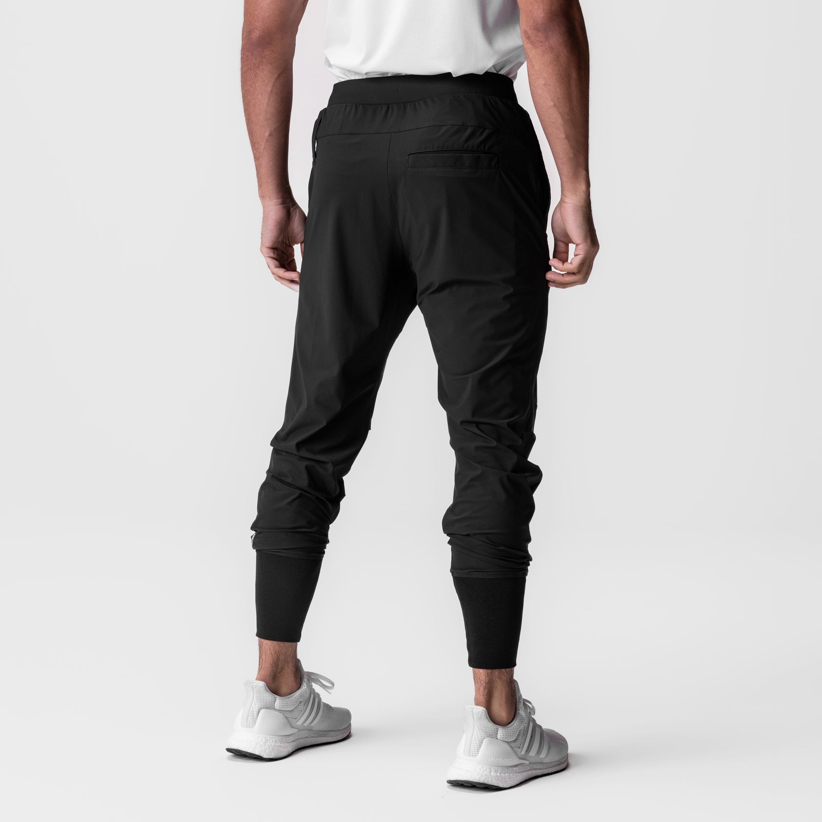 Tetra-Lite® Tech High Rib Jogger in black, rear view on model