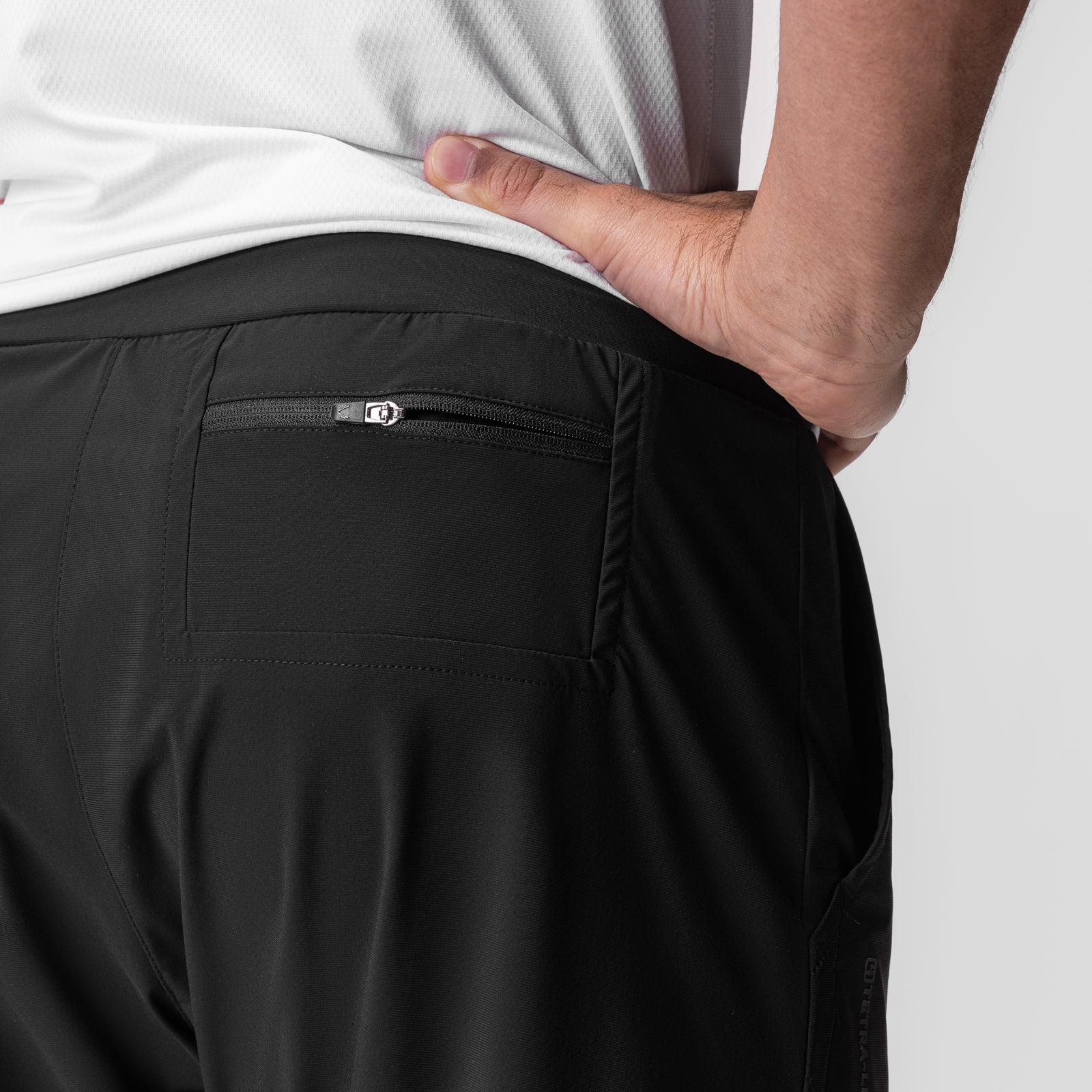 Tetra-Lite 5" Linerless Short in black with reflective details, back pocket detail on model