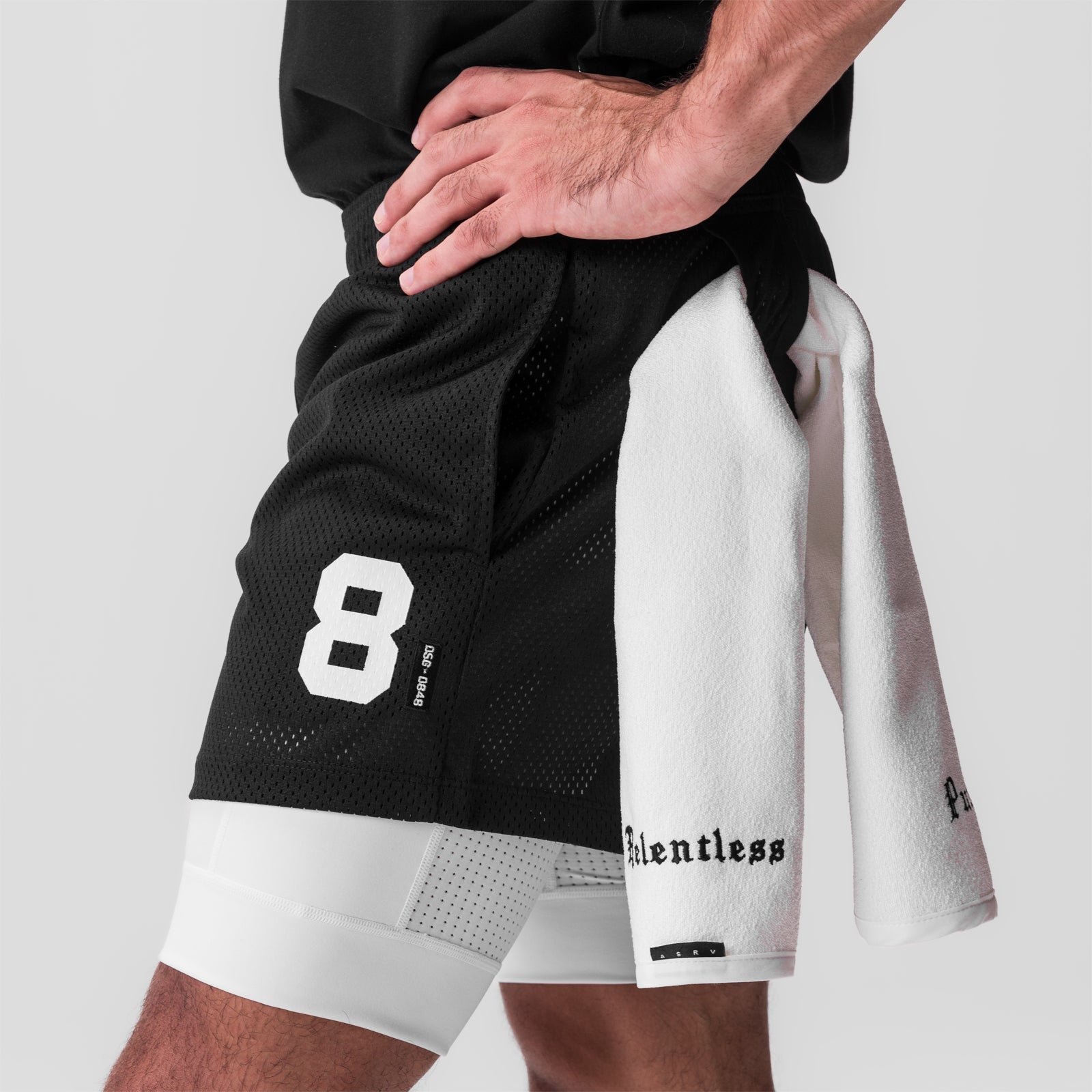 SilverPlus Mesh 5" Liner Short in black/white, worn by model, side view