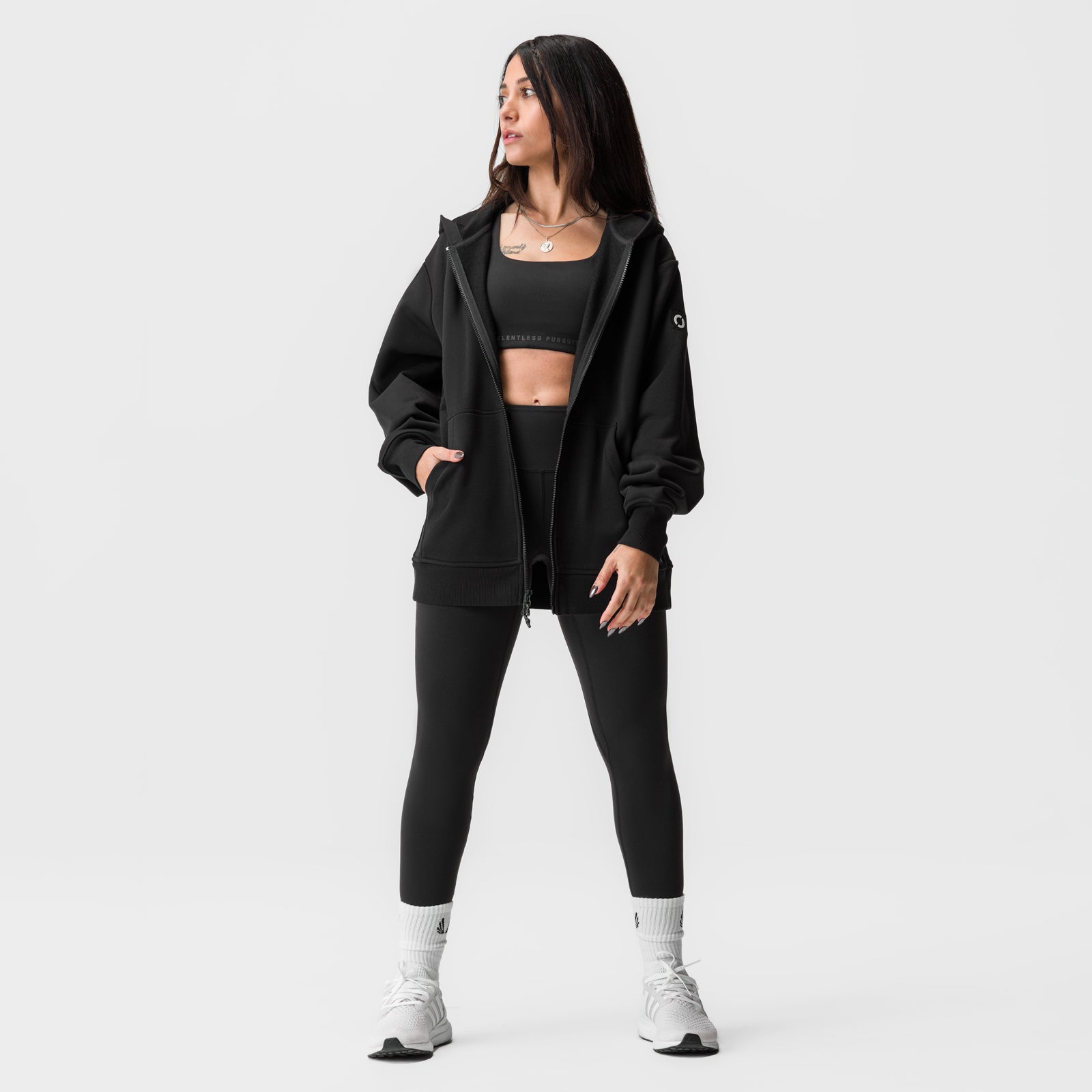 Black Sorona French-Terry Oversized Zip Hoodie worn open over crop top and leggings, front view
