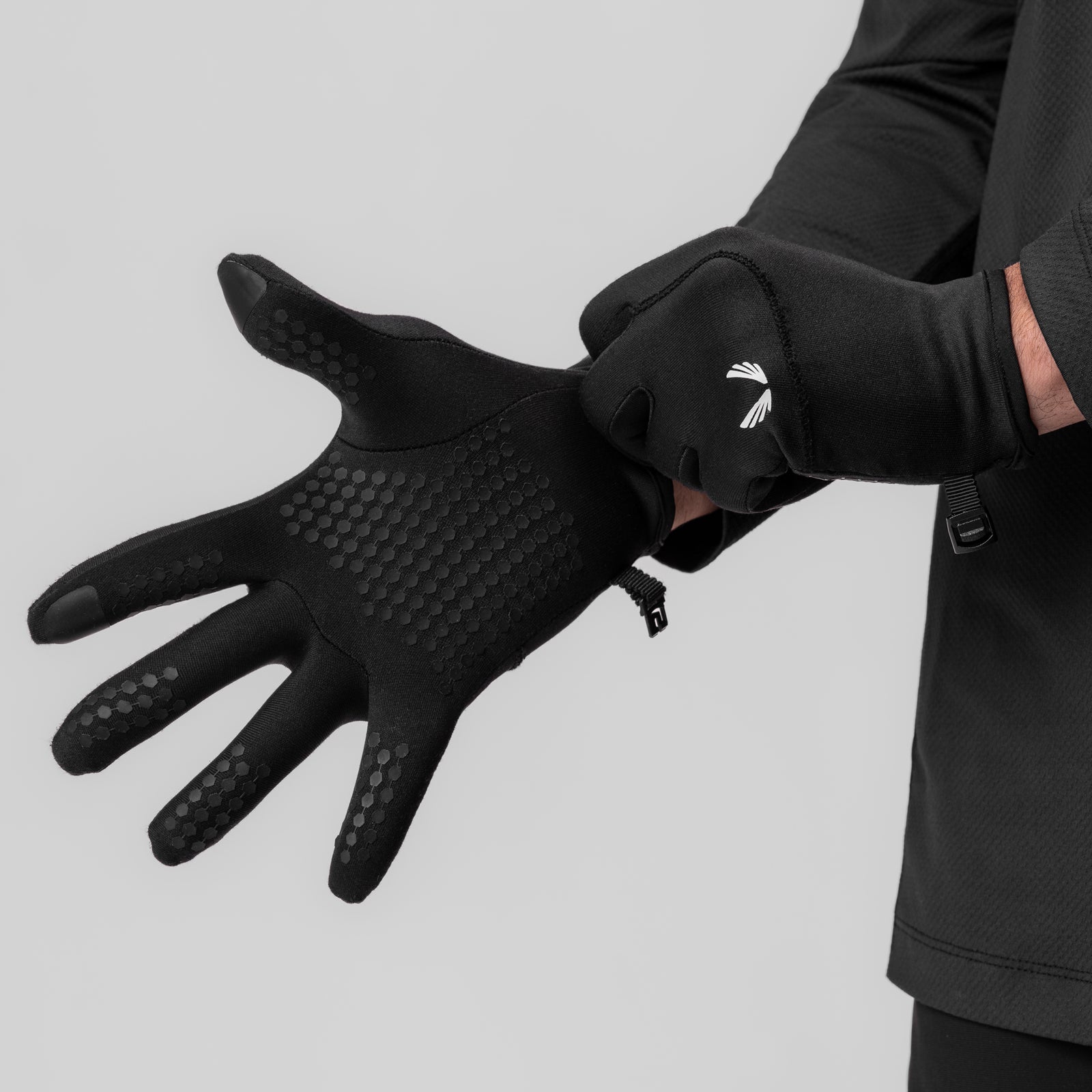 Aeroheat® Lightweight Gloves in black with grip pattern, worn on model's hands