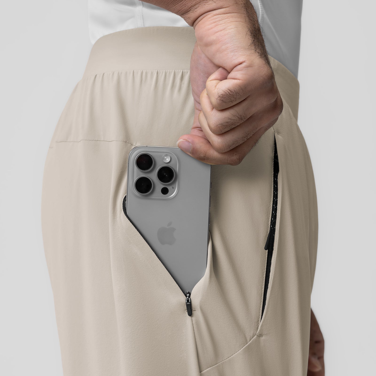 Aerotex Weather-Ready Bonded Pant in Chai, worn by model holding phone in pocket