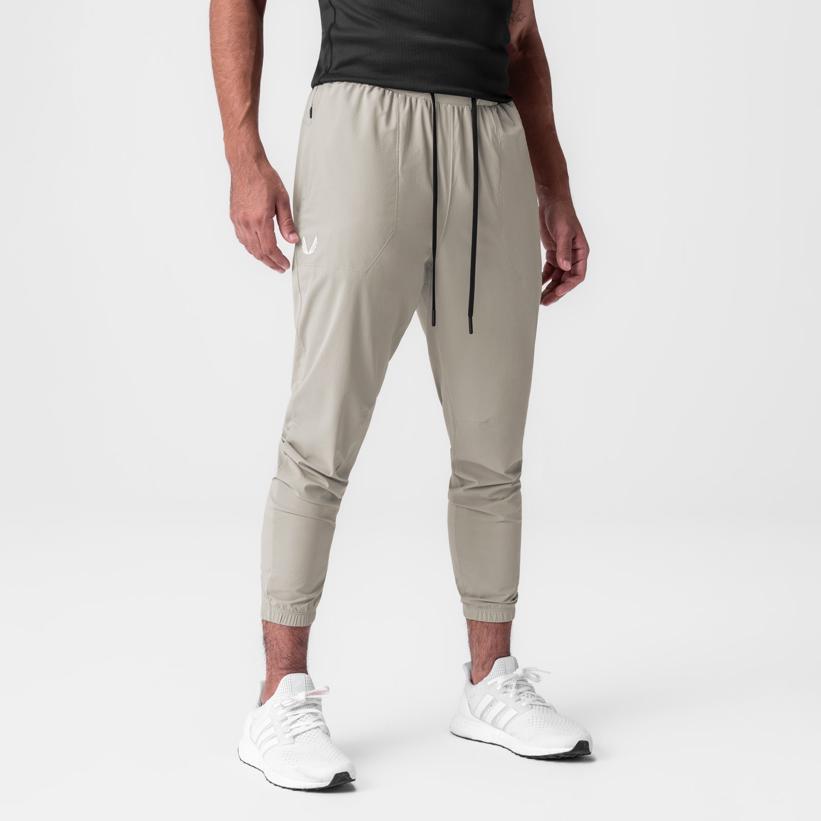 Aerotex™ Training Jogger in chai, worn by model standing, front view