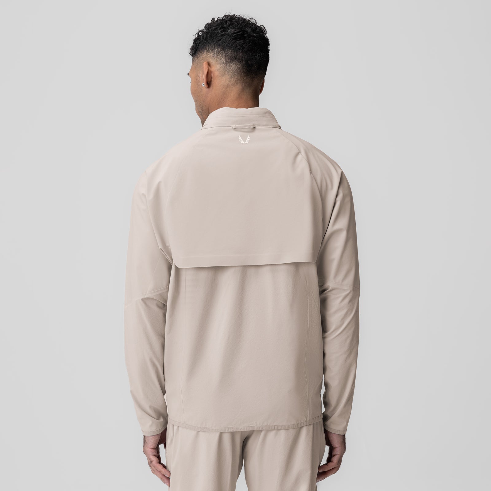 Aerotex Weather-Ready Bonded Windbreaker in Chai, back view worn by model