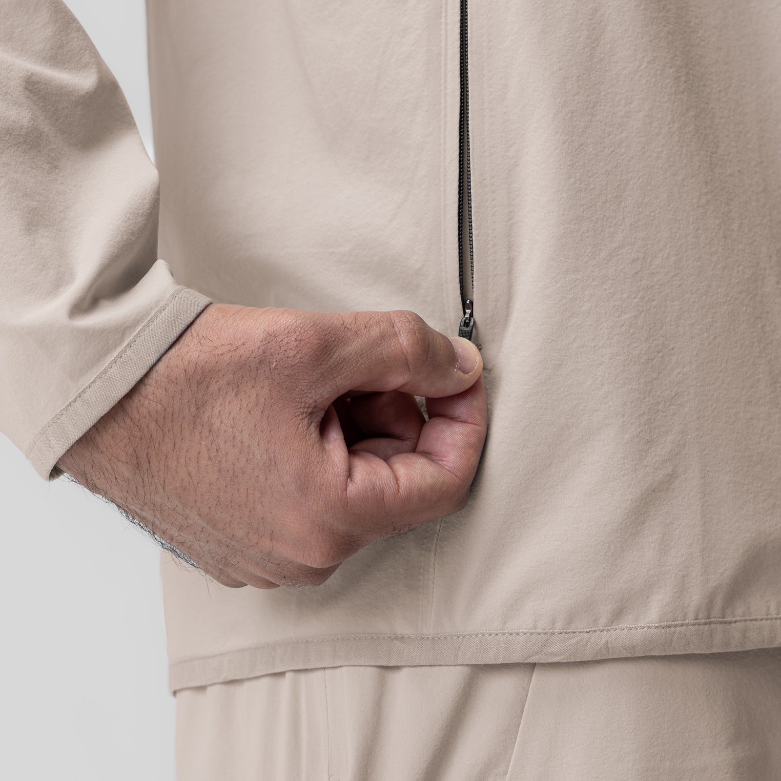 Aerotex Weather-Ready Bonded Windbreaker in chai, worn by model, hand in pocket detail
