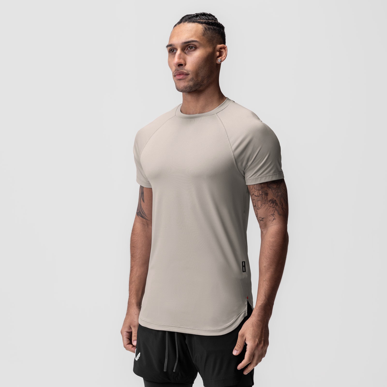 AeroSilver Established Tee in Chai, worn by model in three-quarter view