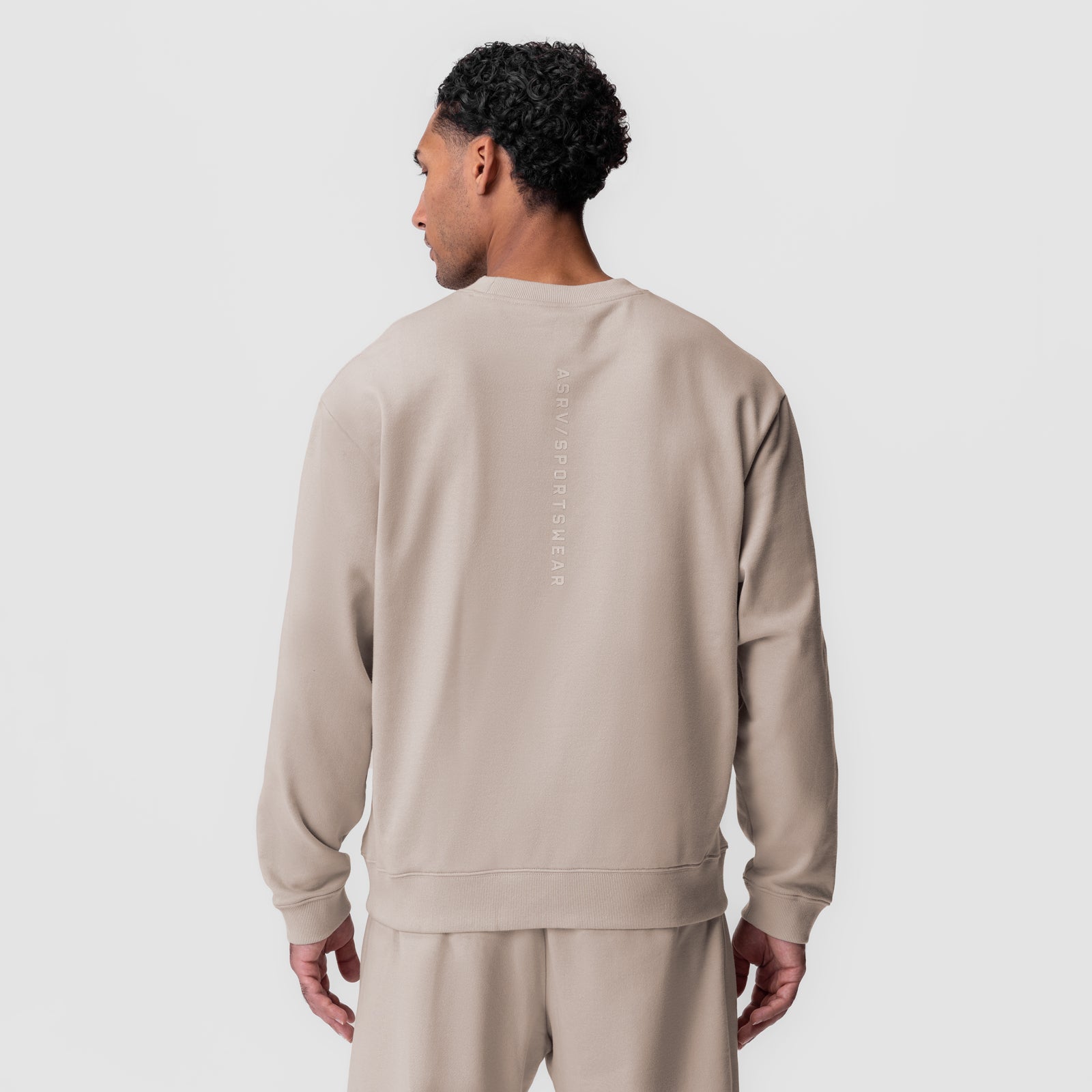 Herringbone Terry Crewneck in Chai, back view on model