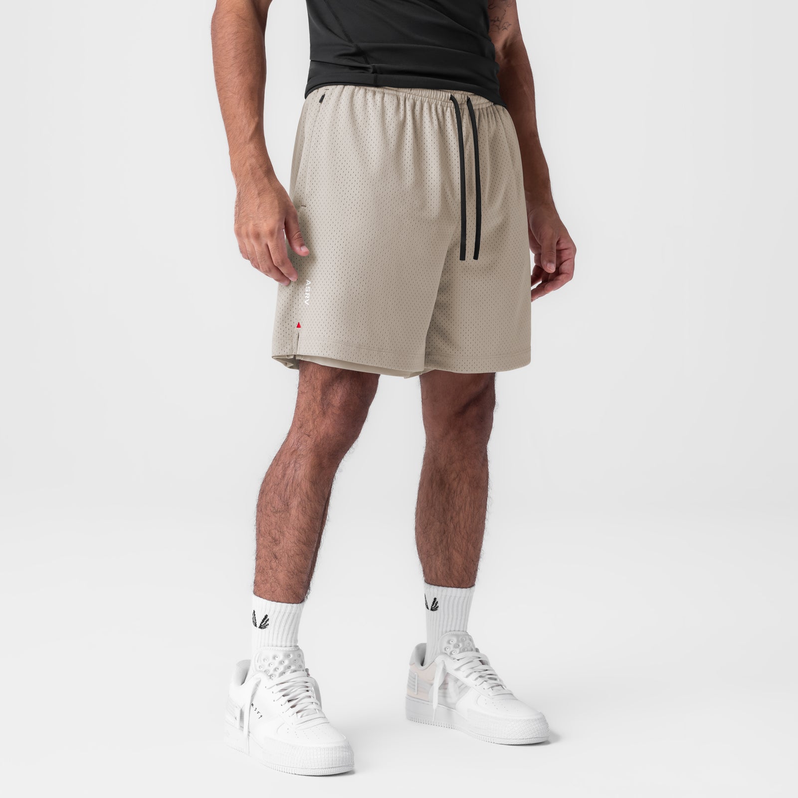 Reversible 2-in-1 Short in Chai worn by model with white sneakers and white socks