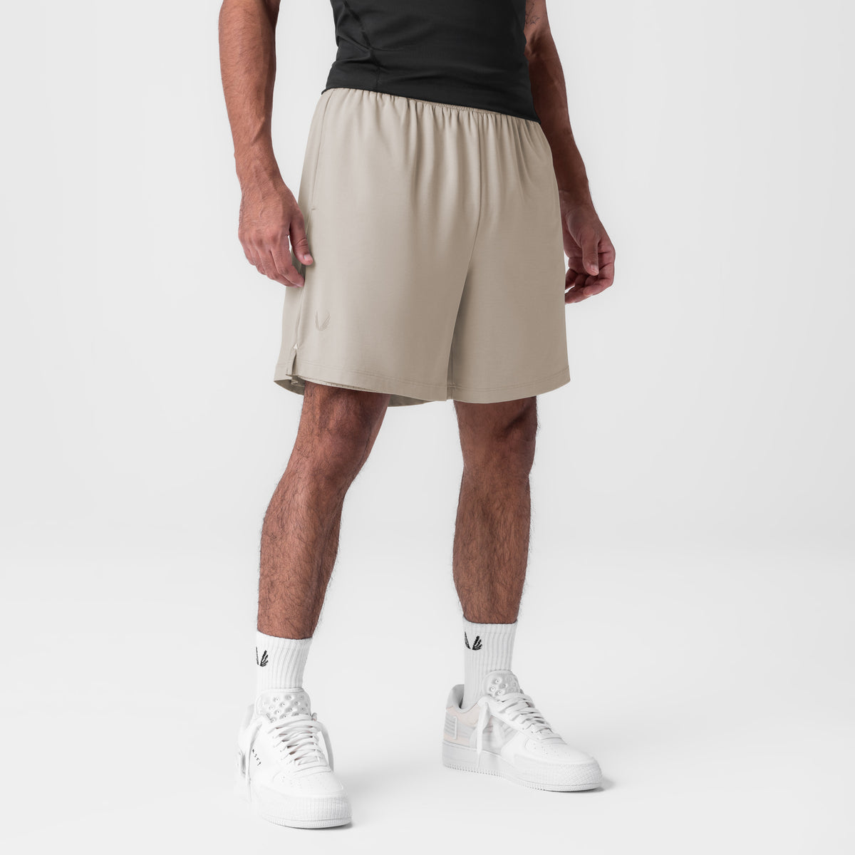 Reversible 2-in-1 Short in Chai worn by male model with white sneakers, front view
