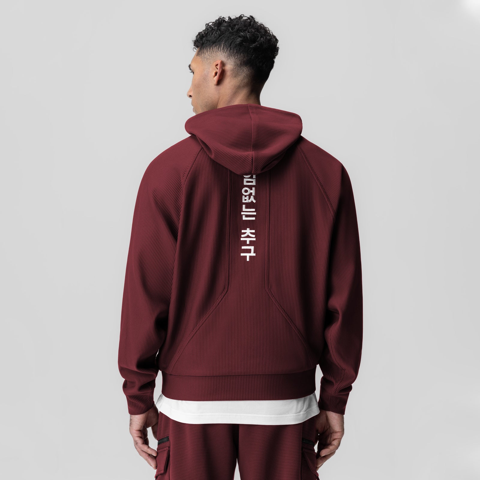 Deltapeak® Oversized Hoodie in crimson, back view on model