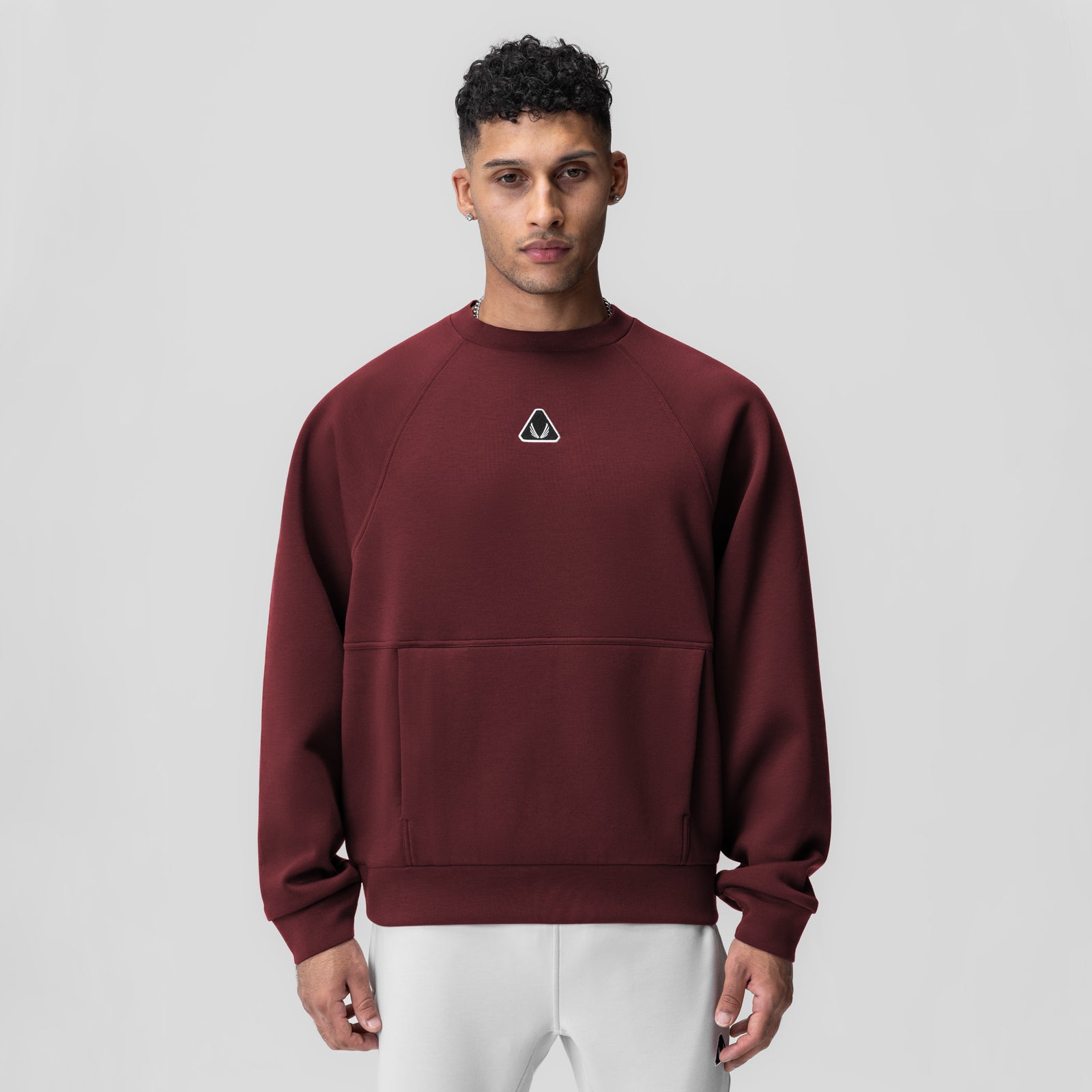 Dri-Core Oversized Crewneck in crimson worn by model, front view