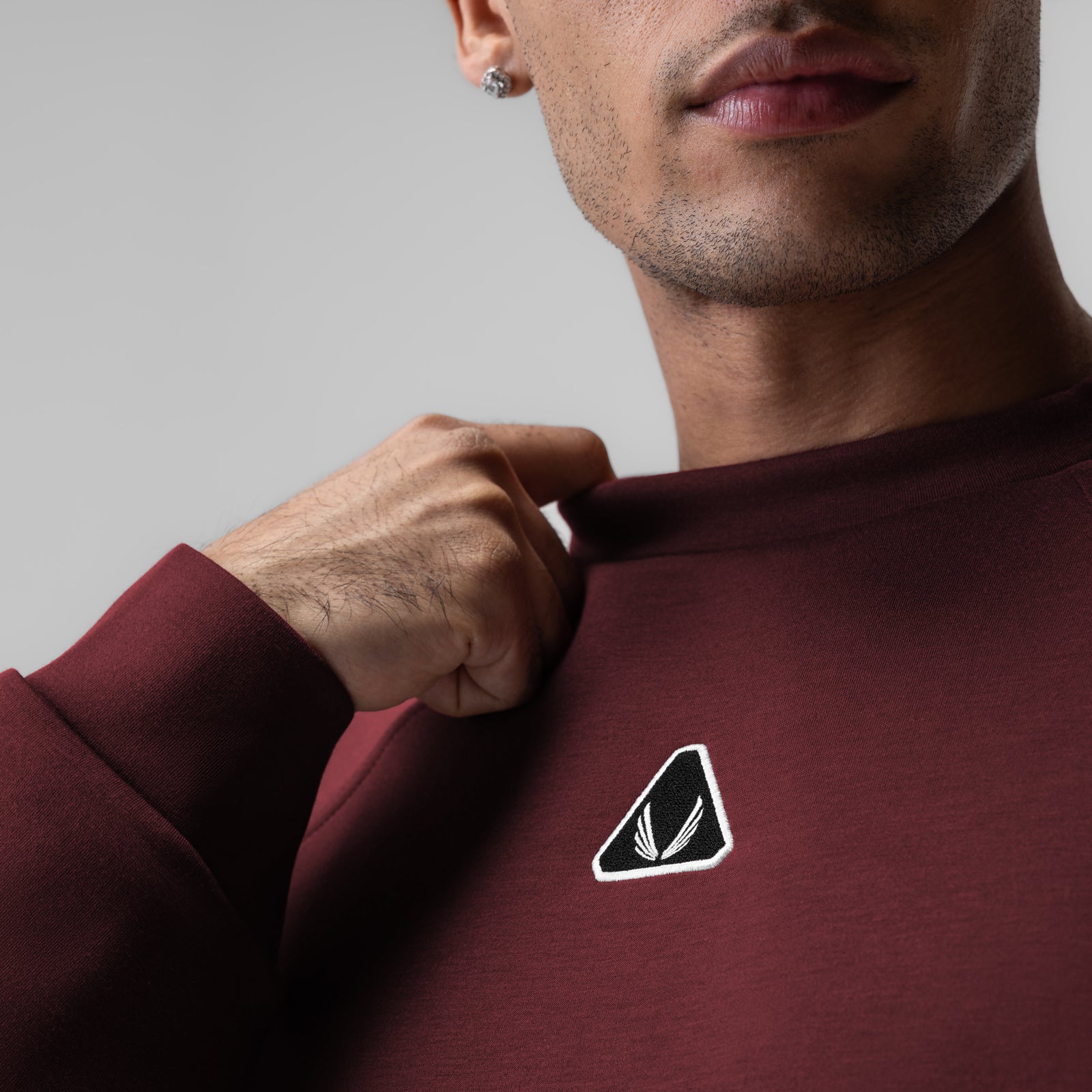 Dri-Core Oversized Crewneck in crimson, modeled from chest up