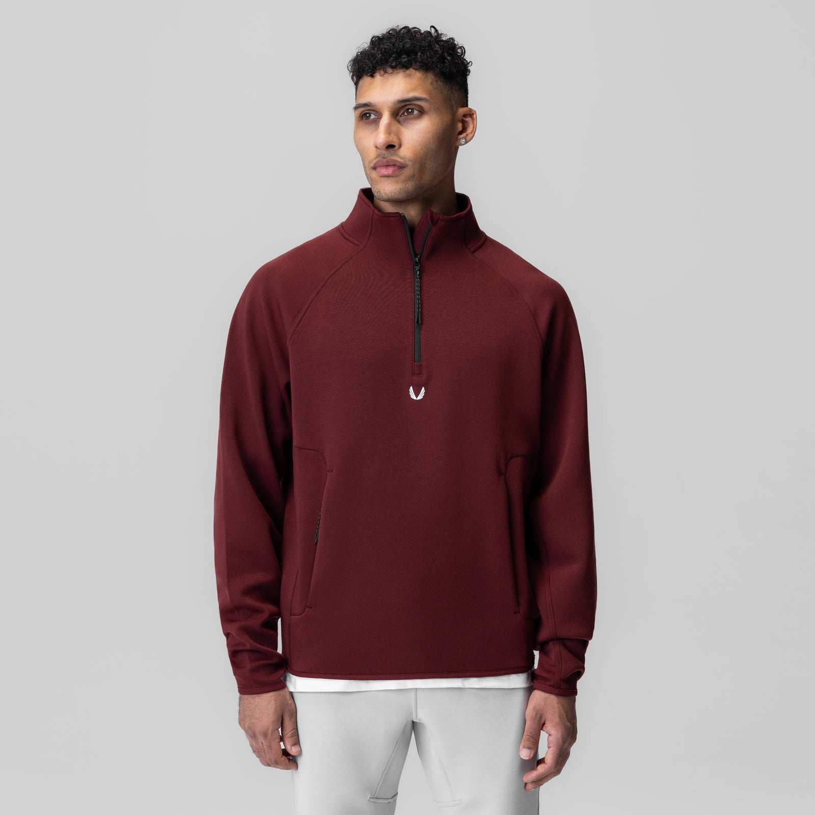 Dri-Core Quarter Zip in crimson worn by model, front view