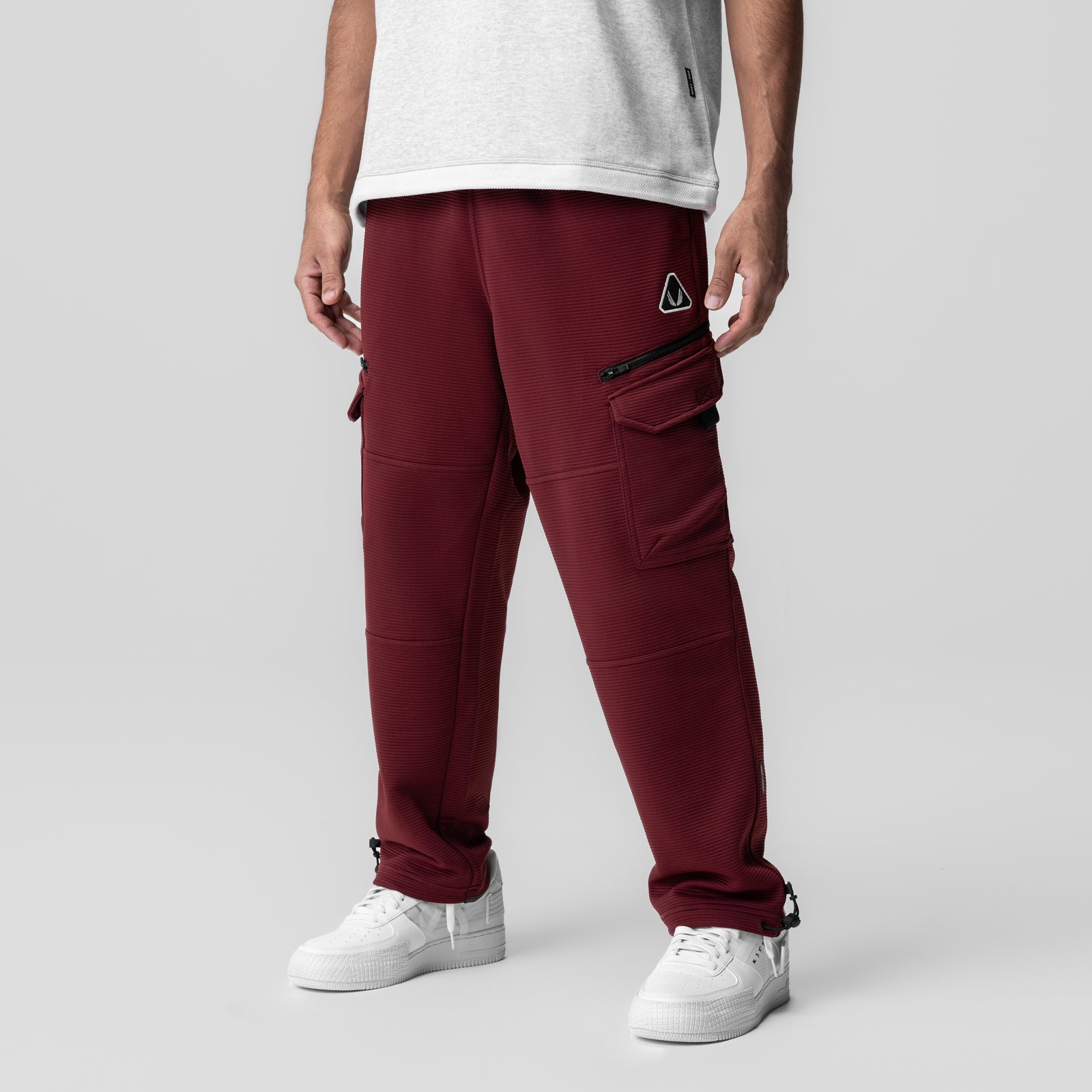 Deltapeak® Cargo Cinch Jogger in crimson worn by model, front view