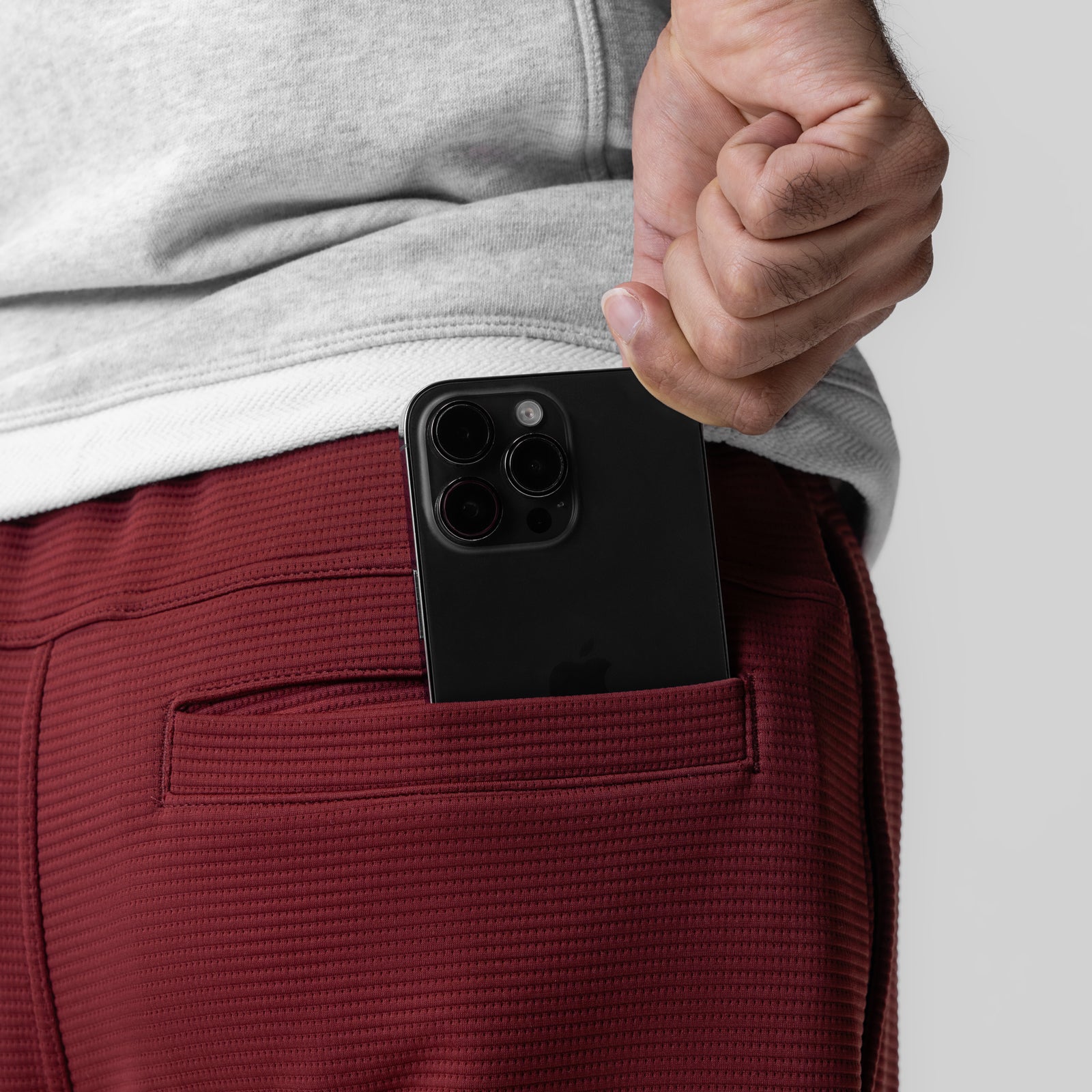 Deltapeak Straight Leg Sweats in Crimson, worn in back pocket detail shot