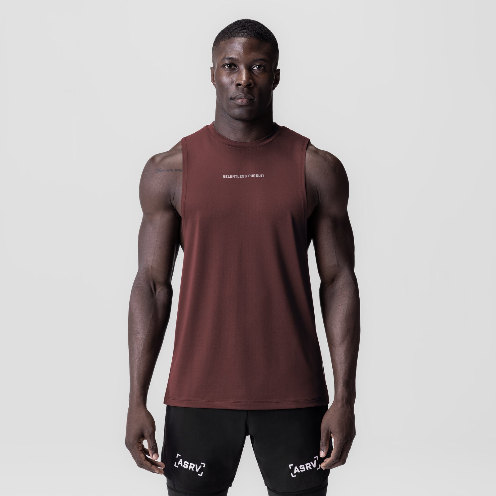 3D-Lite® 2.0 Lycra® Muscle Tank in crimson red worn by male model, front view