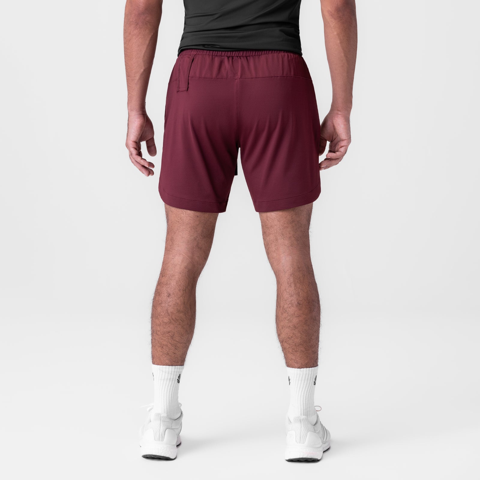 AeroSilver 7" Linerless Short in crimson, rear view on model